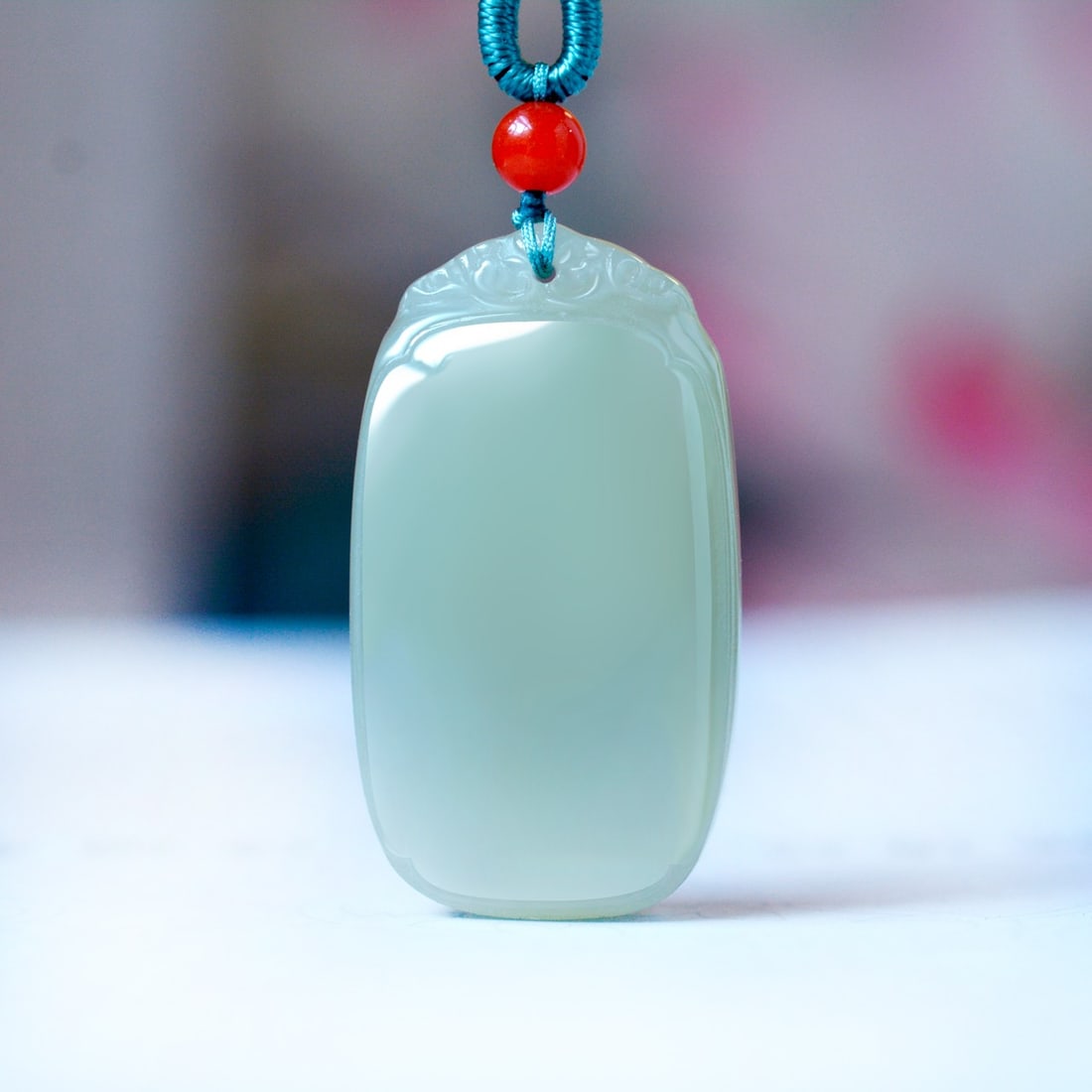 An Exquisite Greenish Jade Pendant (1 of 3)