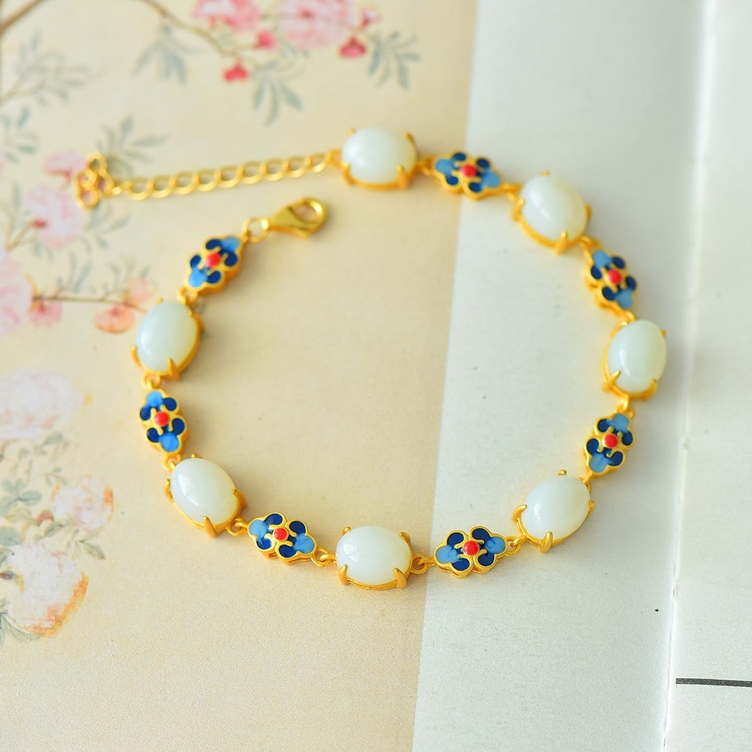 An Exquisite Sterling Silver-Gold Plated Inlaid White Jade Enamel Bracelet: An Exquisite Sterling Silver-Gold Plated Inlaid White Jade Enamel Bracelet,Size:0.3inx0.4in 纯银镀金镶白玉珐琅手链