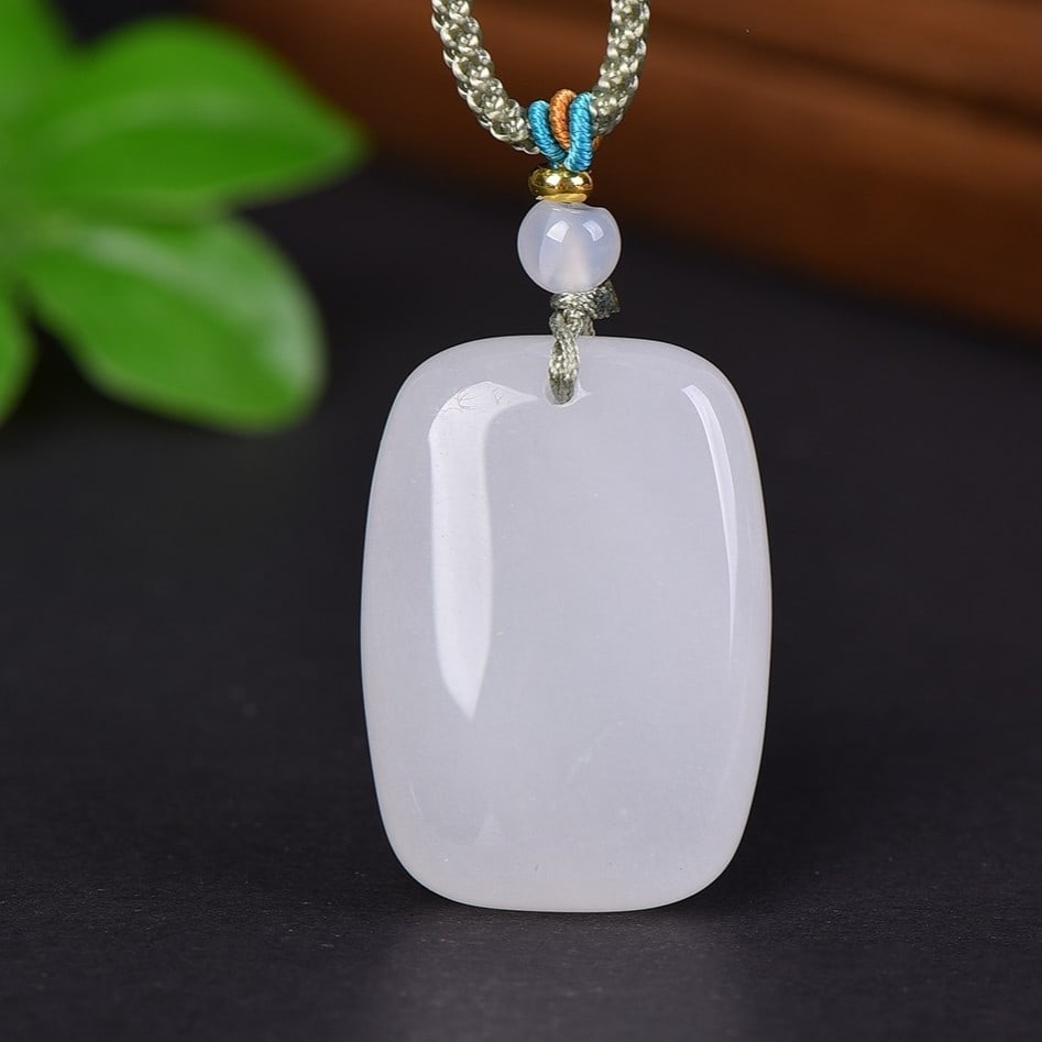 An Exquisite White Jade Pendant: An Exquisite White Jade Pendant,Size:1inx1.4in 白玉挂件