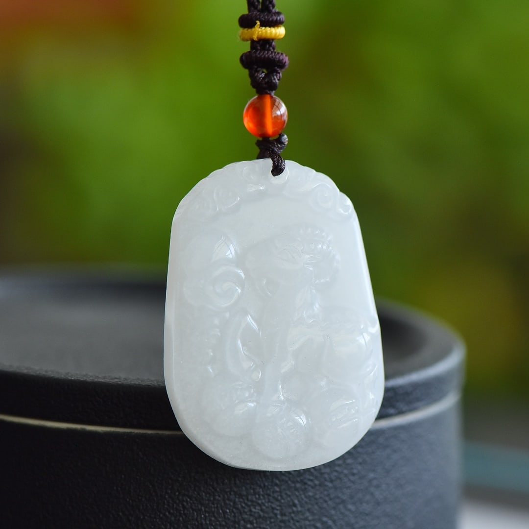 An Exquisite White Jade Sheep Pattern Pendant: An Exquisite White Jade Sheep Pattern Pendant,Size:1.7inx1.3in 白玉羊纹挂件