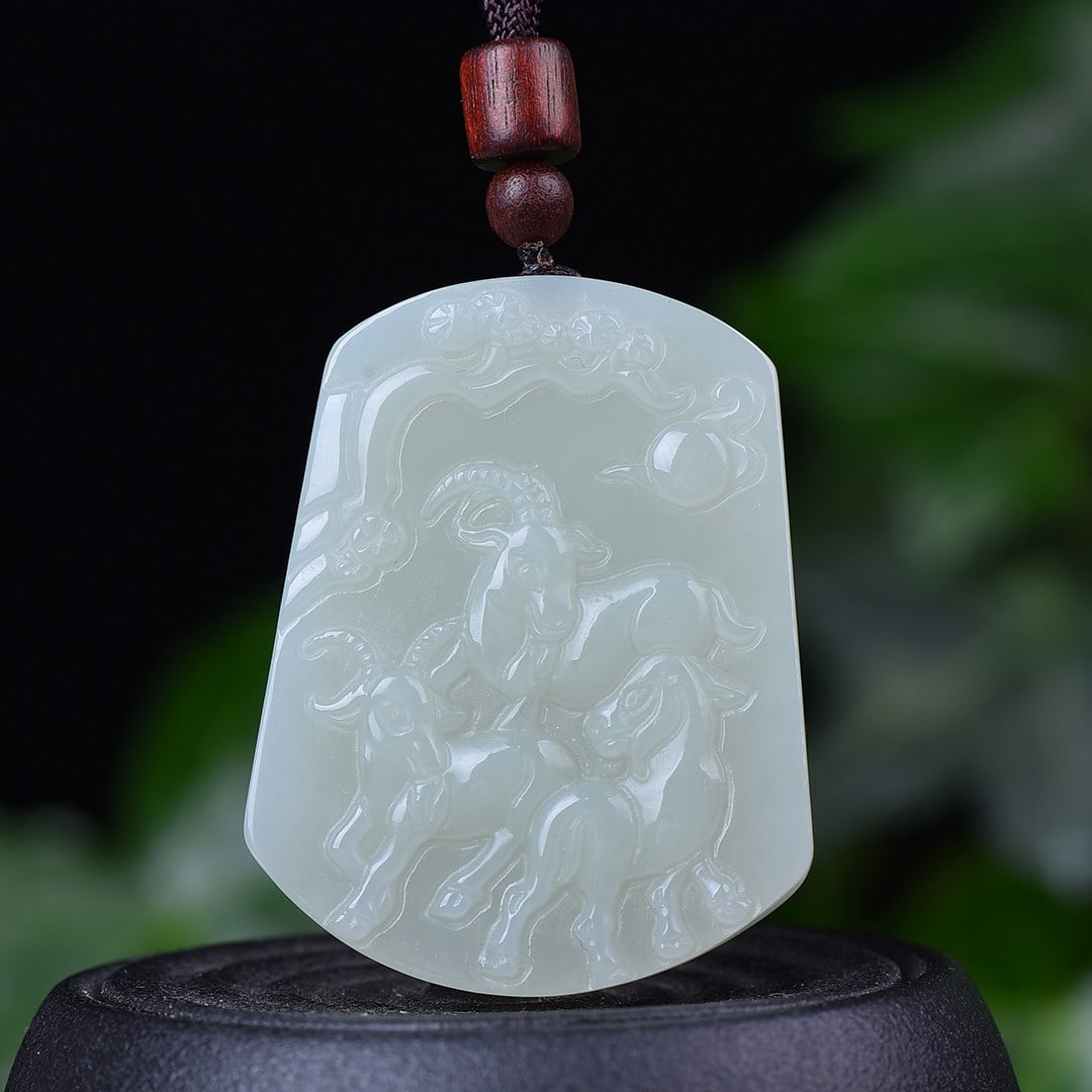 An Exquisite White Jade Sheep Pattern Pendant: An Exquisite White Jade Sheep Pattern Pendant,Size:1.6inx2in 白玉羊纹挂件