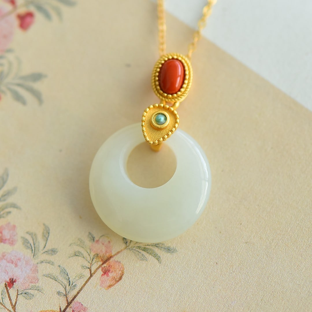 An Exquisite Sterling Silver-Gold Plated Inlaid White Jade Pendant: An Exquisite Sterling Silver-Gold Plated Inlaid White Jade Pendant 纯银镀金镶白玉吊坠