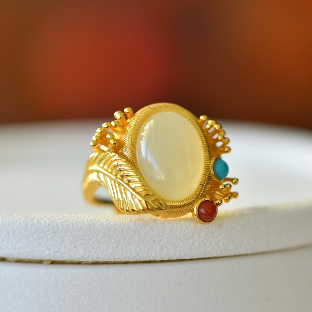 An Exquisite Sterling Silver-Gold Plated Inlaid White Jade Ring: An Exquisite Sterling Silver-Gold Plated Inlaid White Jade Ring,Size:0.4inx0.6in 纯银镀金镶白玉戒指
