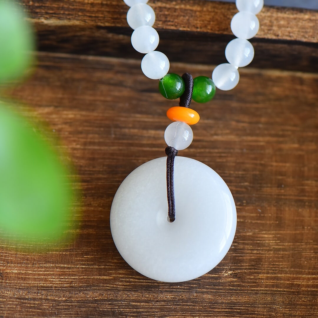 An Exquisite White Jade Pendant: An Exquisite White Jade Pendant,Size:0.3in 白玉挂件