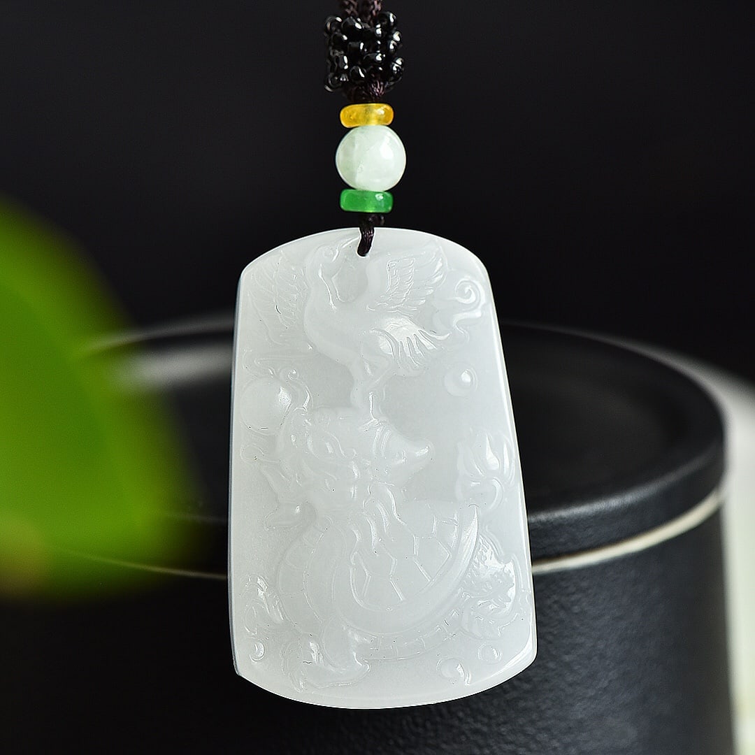 An Exquisite White Jade Auspicious Beast Pattern Pendant: An Exquisite White Jade Auspicious Beast Pattern Pendant 白玉瑞兽纹挂件