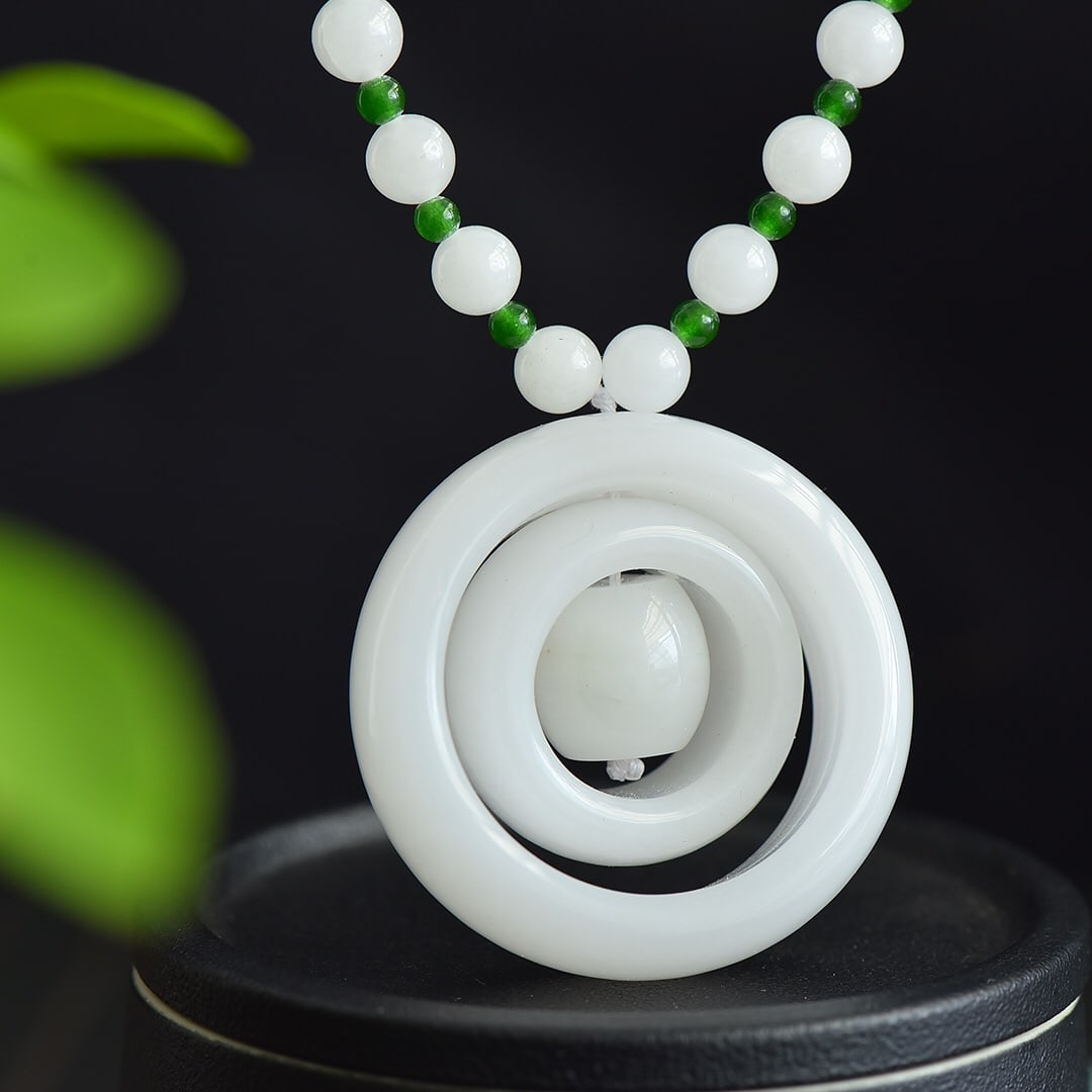 An Exquisite White Jade Pendant: An Exquisite White Jade Pendant,Size:2inx0.6in 白玉挂件