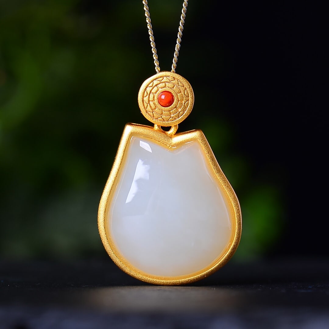 A Set of Fine Sterling Silver-Gold Plated Inlaid White Jade Jewelrys: A Set of Fine Sterling Silver-Gold Plated Inlaid White Jade Jewelrys,Size:(Ring)0.5inx0.6in,(Earrings)0.4inx0.6in,(Pendant)0.7inx0.8in