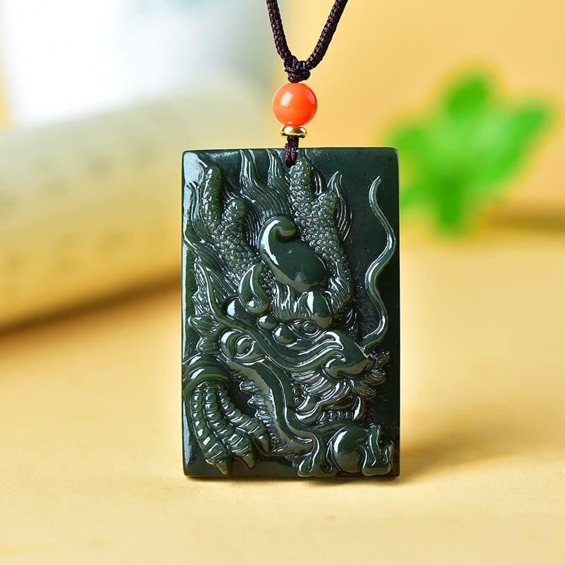 An Exquisite Sapphire Dragon Pattern Pendant: An Exquisite Sapphire Dragon Pattern Pendant,Size:2.3inx1.5in 寓意:纳福.辟邪.代表吉祥 青玉龙纹吊坠