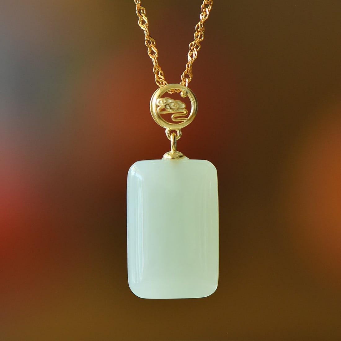 An Exquisite Sterling Silver-Gold Plated Inlaid White Jade Pendant: An Exquisite Sterling Silver-Gold Plated Inlaid White Jade Pendant,Size:0.5inx0.7in 纯银镀金镶白玉吊坠