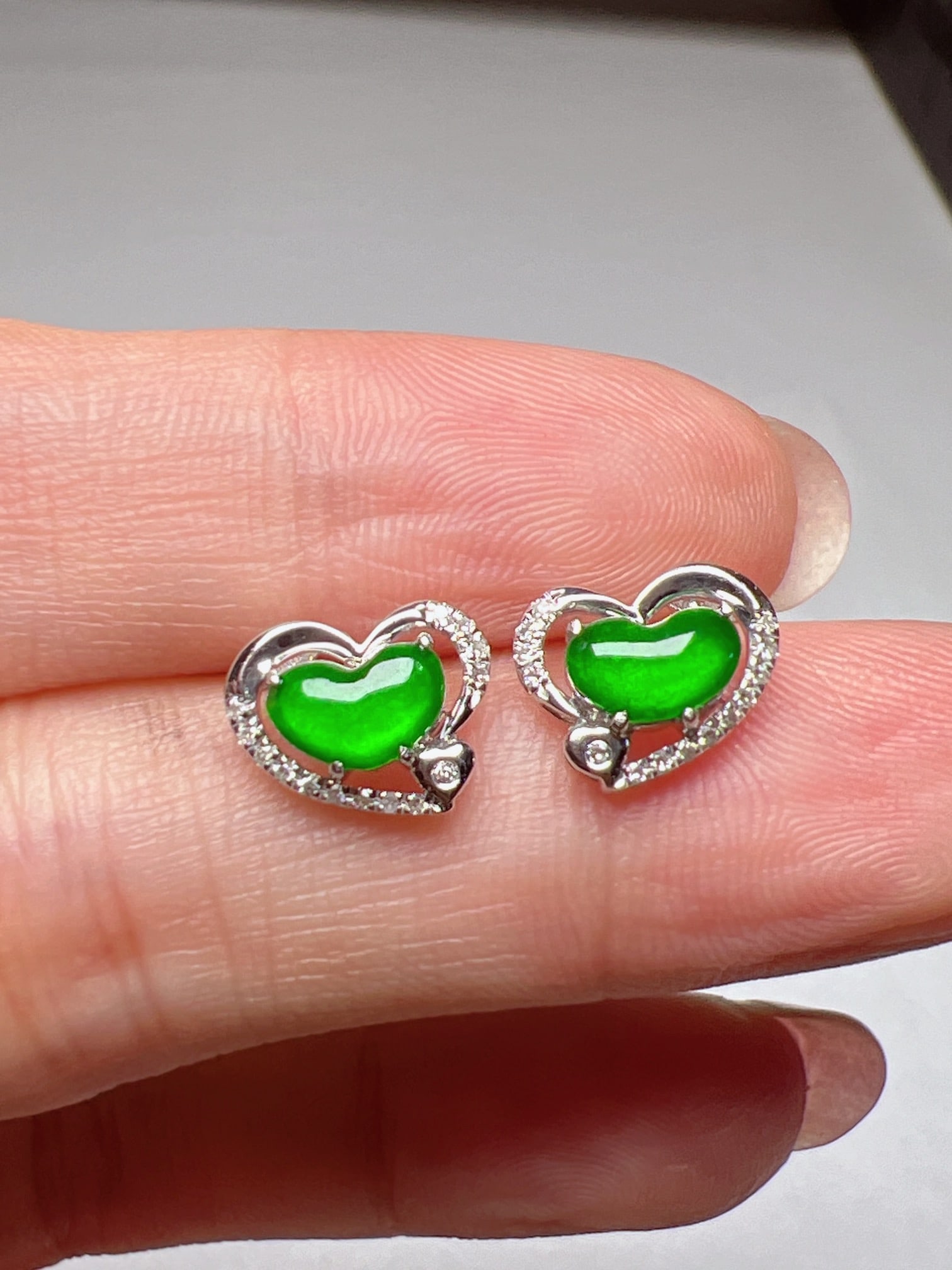 A Pair of Exquisite 18k Gold Diamond Inlaid Jadeite Earrings: A Pair of Exquisite 18k Gold Diamond Inlaid Jadeite Earrings,Size(Loose Stone):0.3inx0.2in 一对18k金钻镶嵌翡翠耳钉
