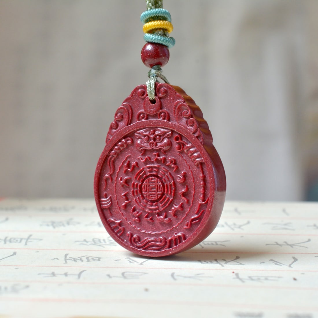 An Exquisite Cinnabar Trigram and Beast-Face Pattern Pendant: An Exquisite Cinnabar Trigram and Beast-Face Pattern Pendant,Size:1.1inx1.4in (寓意)吉祥招财喜庆、驱邪避凶 朱砂