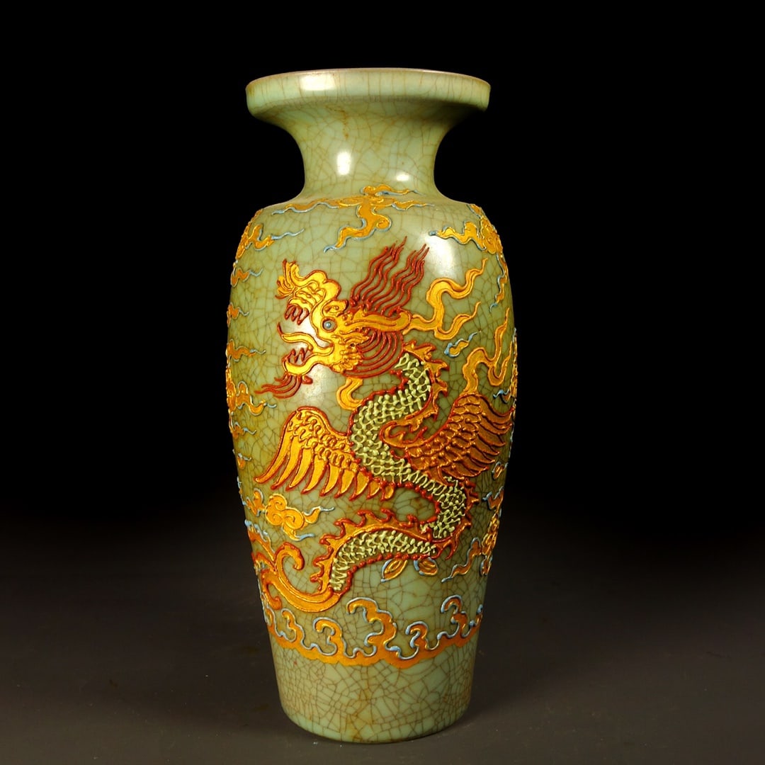 An Exquisite Ru yao Inlaid Gilt Bronze Dragon Pattern Vase Ornament: An Exquisite Ru yao Inlaid Gilt Bronze Dragon Pattern Vase Ornament Qing Dynasty, China Size:11inx5.1in Weight:1045g汝窑手绘花瓶摆件 中国
