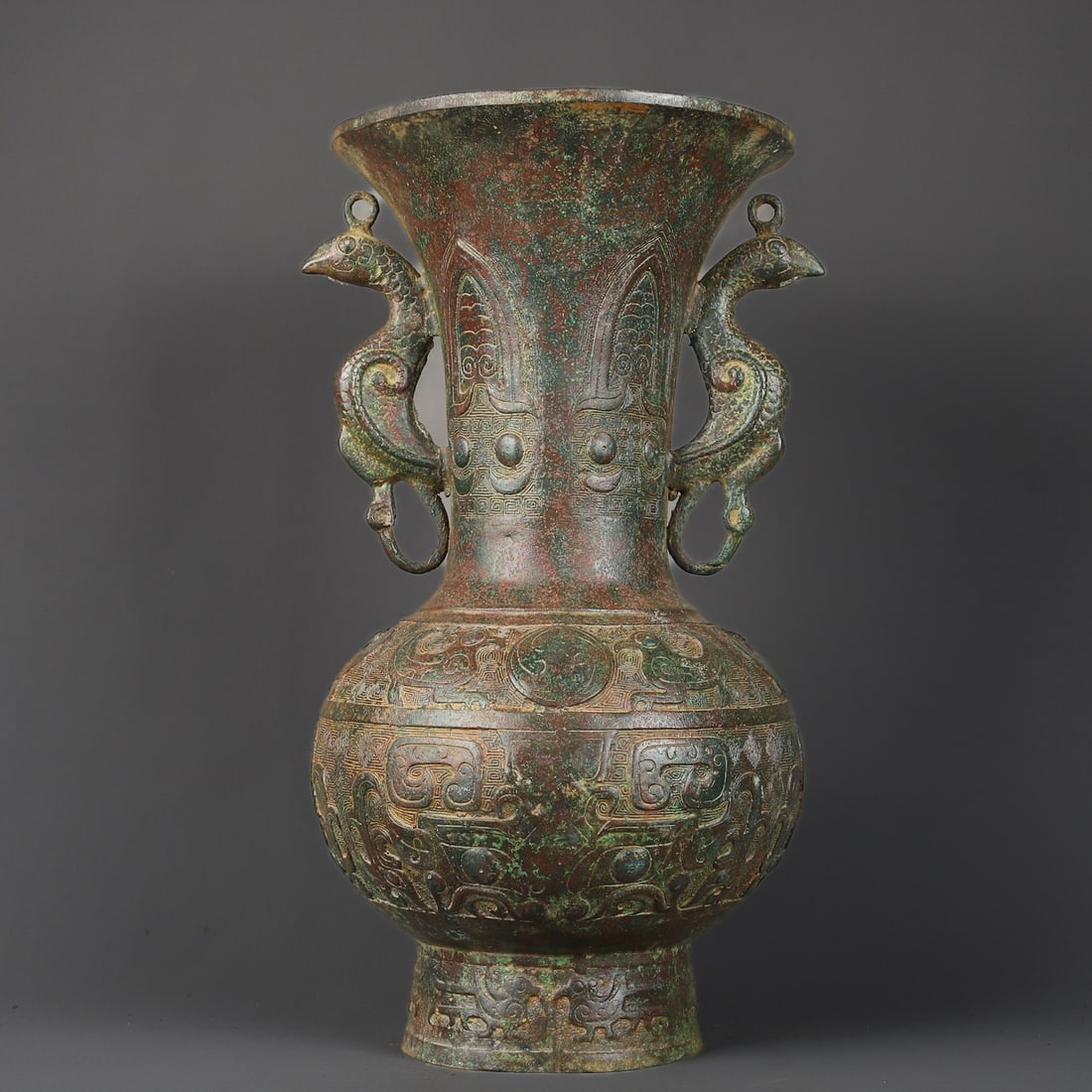 An Exquisite Bronze Beast-Face Pattern With Inscription Double-Ears Vase: An Exquisite Bronze Beast-Face Pattern With Inscription Double-Ears Vase W.Zhou , China Size:9.8inx16.5in Weight:6300g青铜兽面双凤圆尊 西周&
