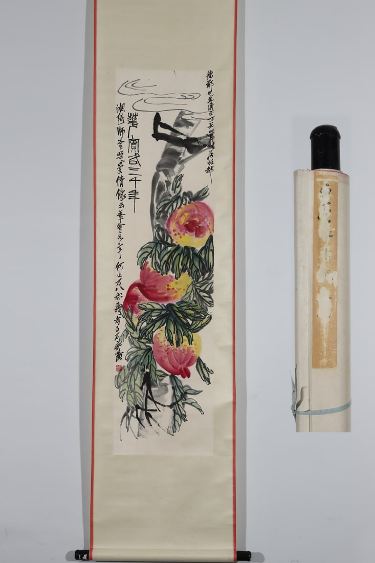 A Chinese Vertical Scroll Ink Painting of Peach on Paper: A Chinese Vertical Scroll Ink Painting of Peach on Paper Qi baishi Without frame Size:51.6inx13.6in齐白石作万寿圖軸 纸本立轴With