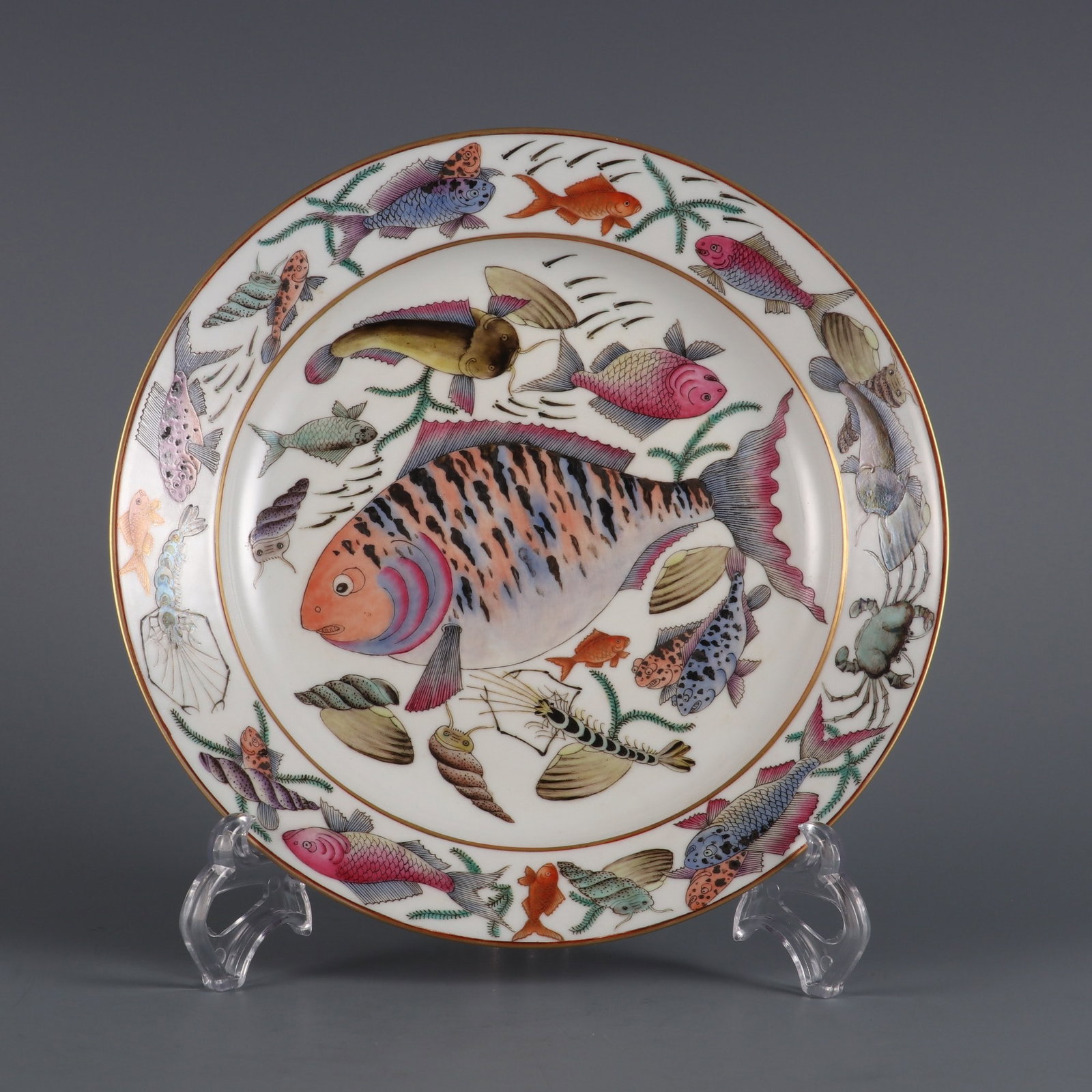 A Exquisite Famille-Rose Fish and Lotus Pattern Plate: A Exquisite Famille-Rose Fish and Lotus Pattern Plate Qing Dynasty, China Kangxi Six-character Mark Size:1.3inx8.3in粉彩鱼虾图折腰盘 中国