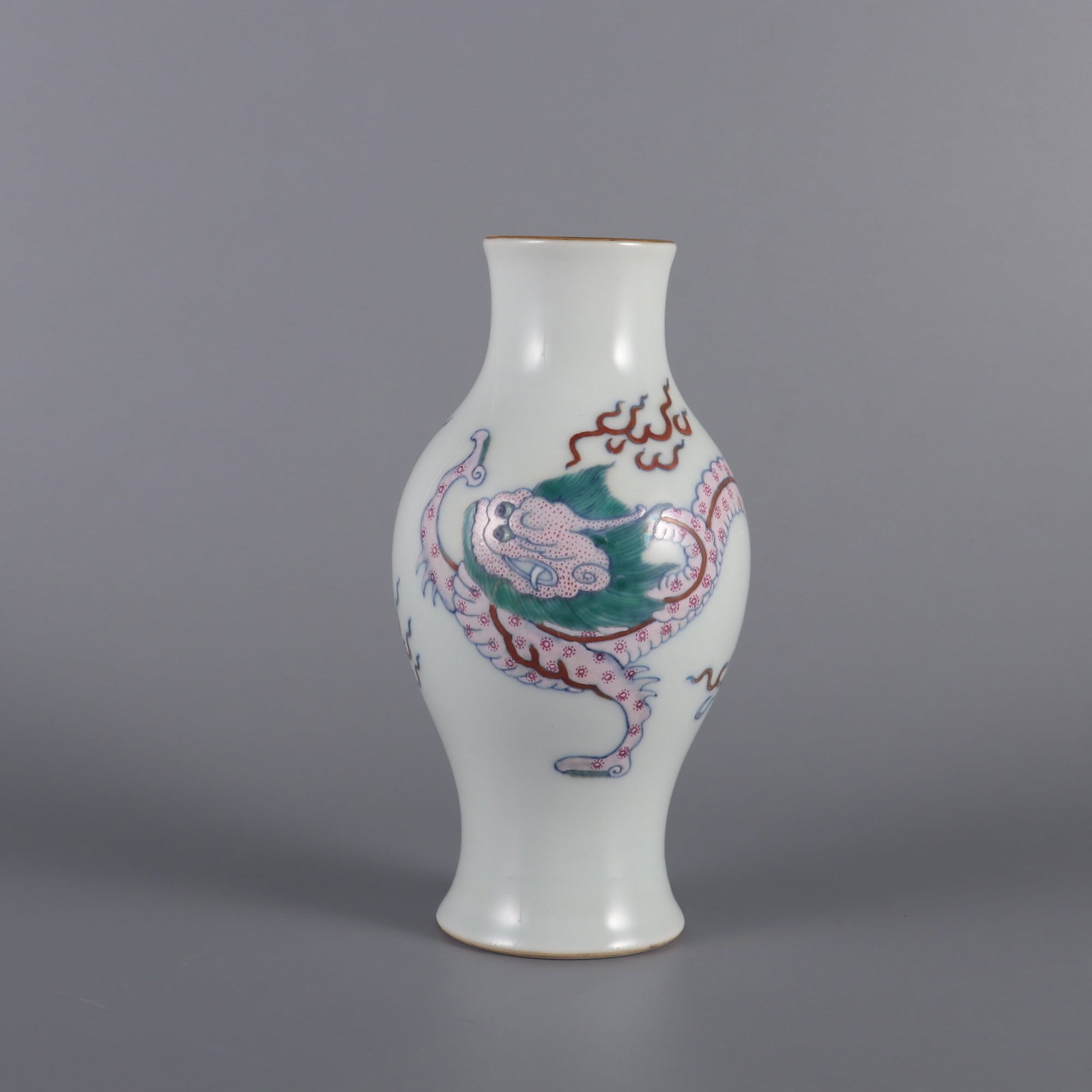 An Exquisite Doucai Dragon Pattern Vase: An Exquisite Doucai Dragon Pattern Vase Qing Dynasty, China Yongzheng Six-character Mark Size:6.6inx3.3in斗彩赤龙纹小尊瓶