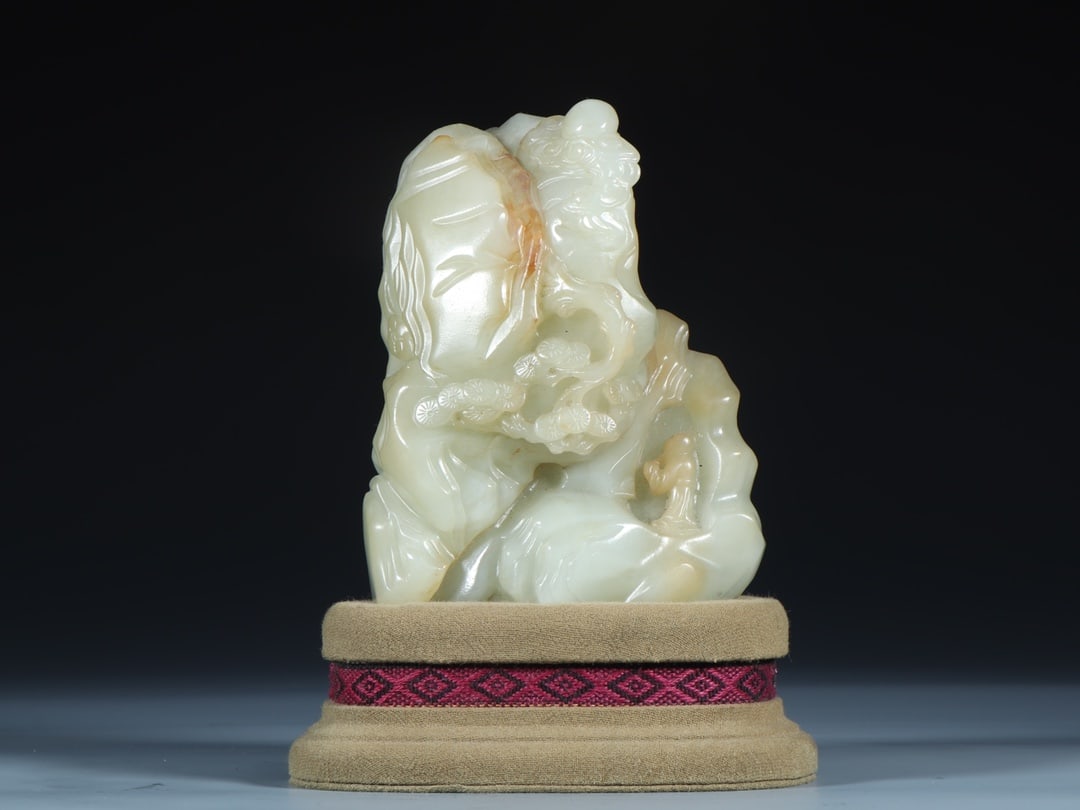 An Exquisite White Jade Character and Story Pattern Rockery Ornament: An Exquisite White Jade Character and Story Pattern Rockery Ornament Qing Dynasty, China Size:3.5inx2.2inx4.5in