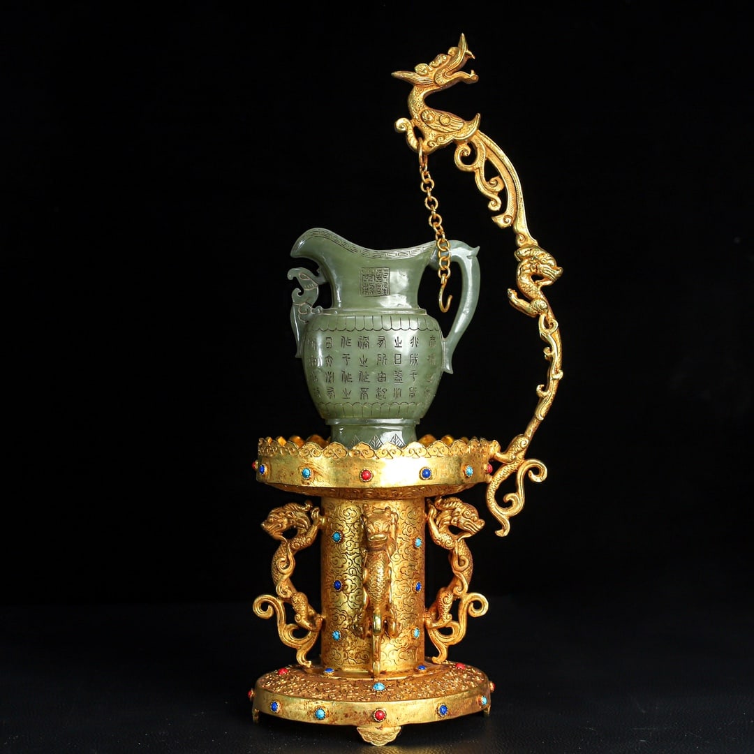 An Exquisite Gilt Bronze Inlaid White Jade Goblet: An Exquisite Gilt Bronze Inlaid White Jade Goblet Qing Dynasty, China Qianlong Four-character Mark Size:16.1inx7.7in Weight:2404g Size:5.5inx4.6in Weight:284g铜鎏金白玉&#