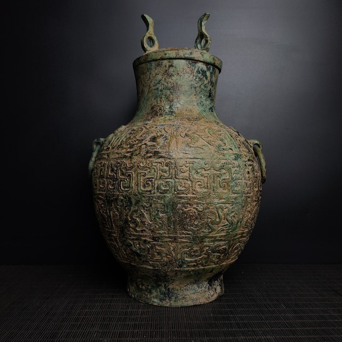 An Exquisite Bronze Dragon Pattern With Inscription Double-Ears Vase: An Exquisite Bronze Dragon Pattern With Inscription Double-Ears Vase the Warring States period in China Size:12.6inx8.7in Weight:3.5kg青铜龙纹圆瓶 战国&