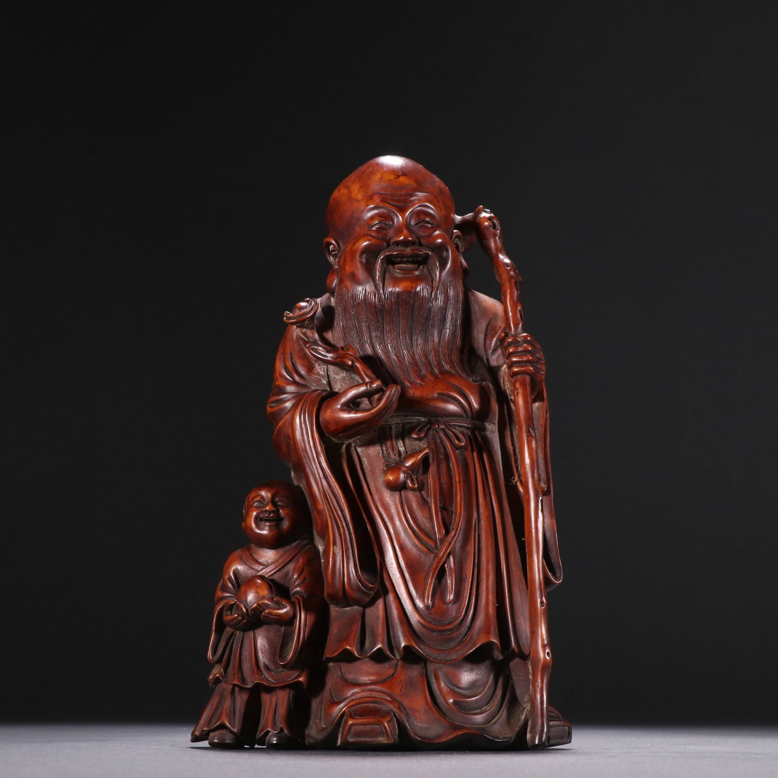 An Exquisite Boxwood Figure Ornament: An Exquisite Boxwood Figure Ornament Qing Dynasty, China Size:7.1inx10.5?? Weight:460g黄杨木寿仙童子摆件 中国清代