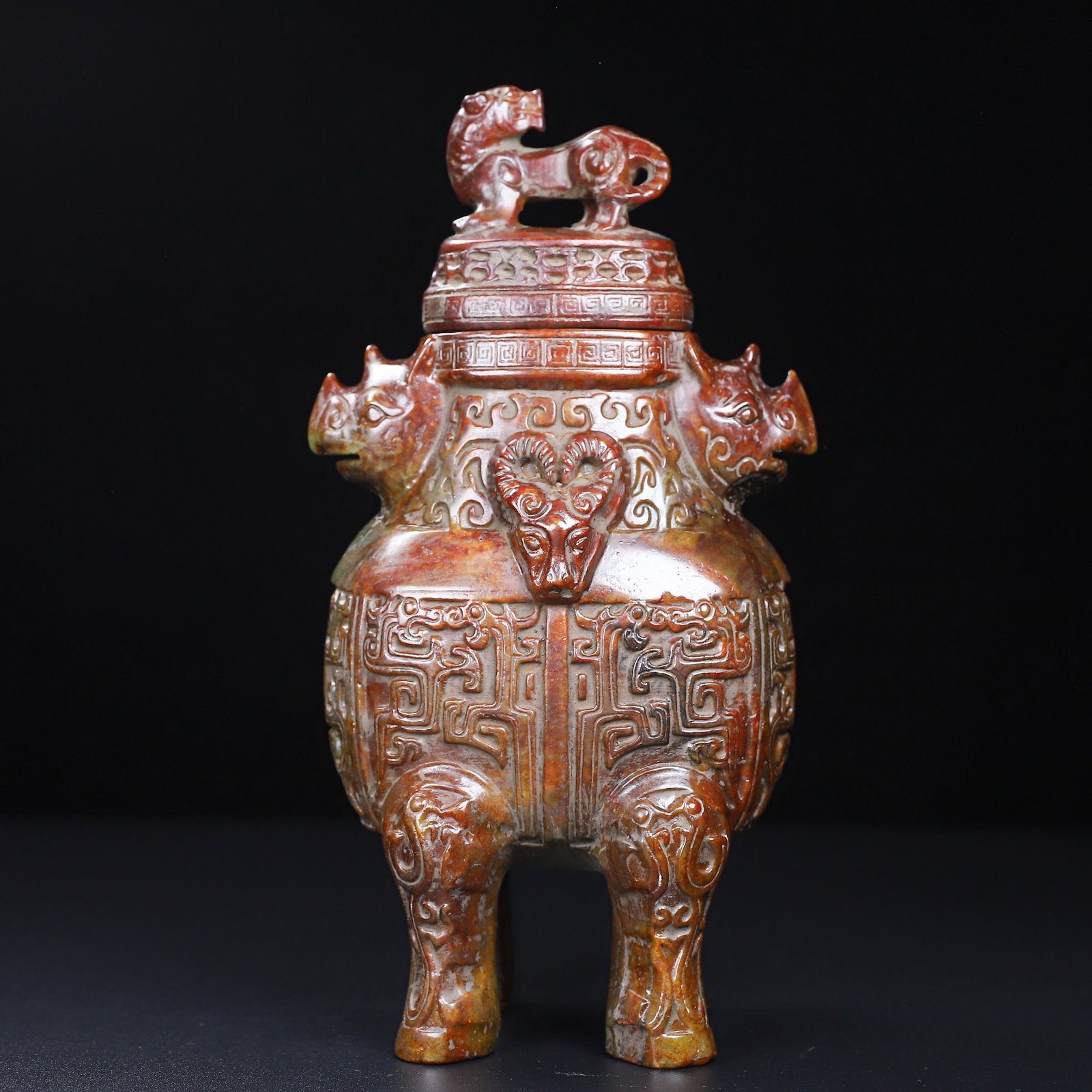 An Exquisite White Jade Rhinoceros Pattern Vase: An Exquisite White Jade Rhinoceros Pattern Vase Han Dynasty, China Size:5.6inx5.1inx3.2in Weight:2.141kg白玉犀牛瓶 中国汉代