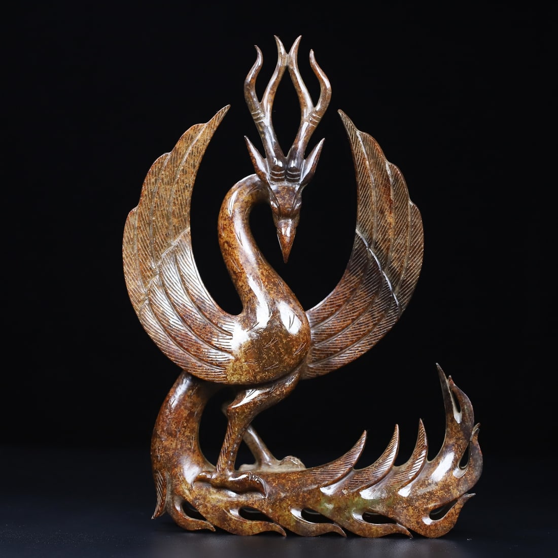 An Exquisite White Jade Phoenix Ornament: An Exquisite White Jade Phoenix Ornament Han Dynasty, China Size:9.2inx6.7inx1.4in Weight:579.5g白玉凤鸟 中国汉代 Size:23.4cmx17cmx3.6cm Weight:579.5g