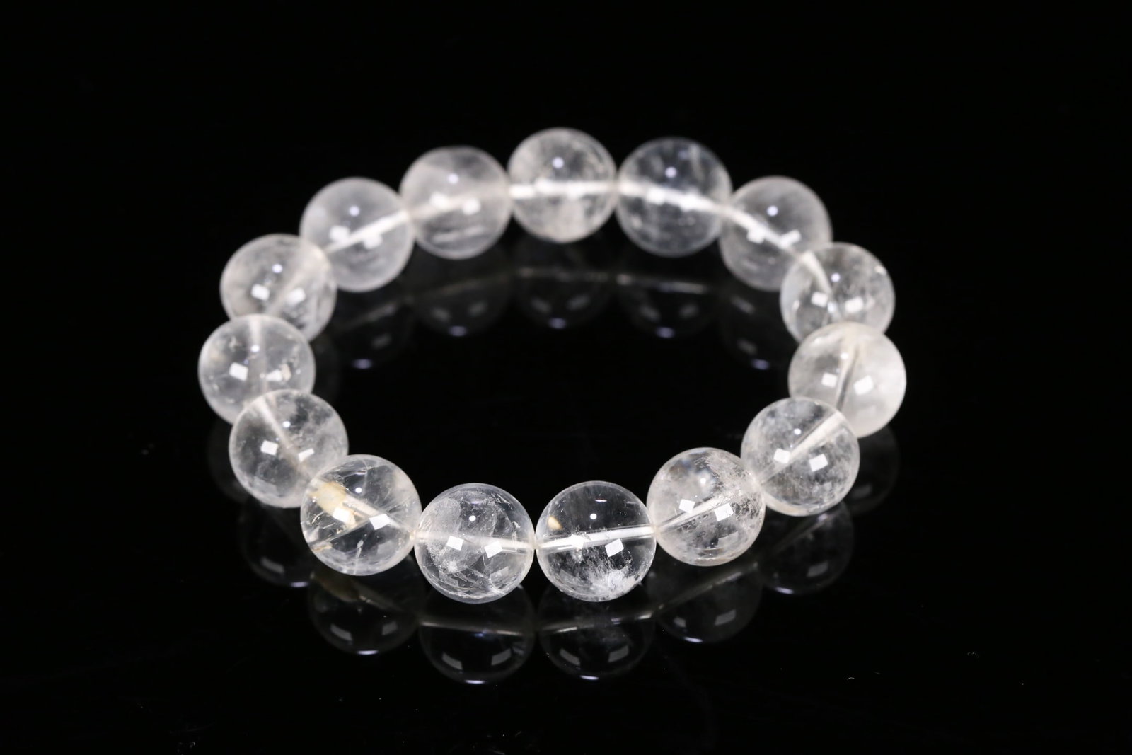 An Exquisite Crystal Bracelets: An Exquisite Crystal Bracelets Qing Dynasty, China Size:0.6in Weight:61.6g水晶圆珠手串 中国清代 Size:1.5cm Weight:61.6g