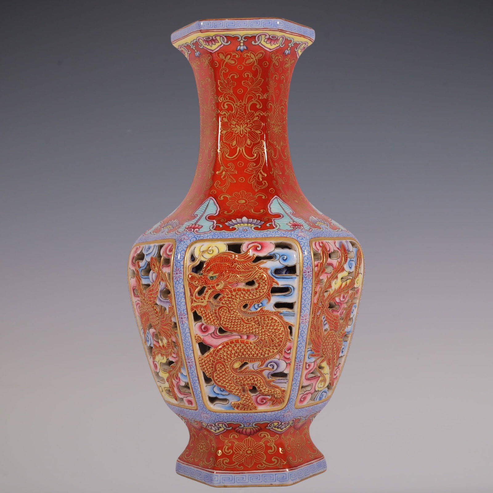 An Exquisite Iron-Red Painted Gold Dragon and Phoenix Pattern Lotus Pattern Vase: An Exquisite Iron-Red Painted Gold Dragon and Phoenix Pattern Lotus Pattern Vase Qing Dynasty, China Qianlong Four-character Mark