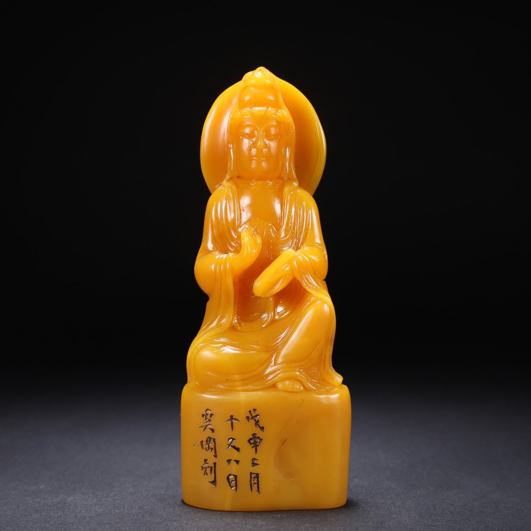 An Exquisite Tianhuang Stone Statue of Avalokitesvara Seal: An Exquisite Tianhuang Stone Statue of Avalokitesvara Seal Qing Dynasty, China Size:4.8inx0.9inx2in Weight:196g田黄石坐观音钮印章