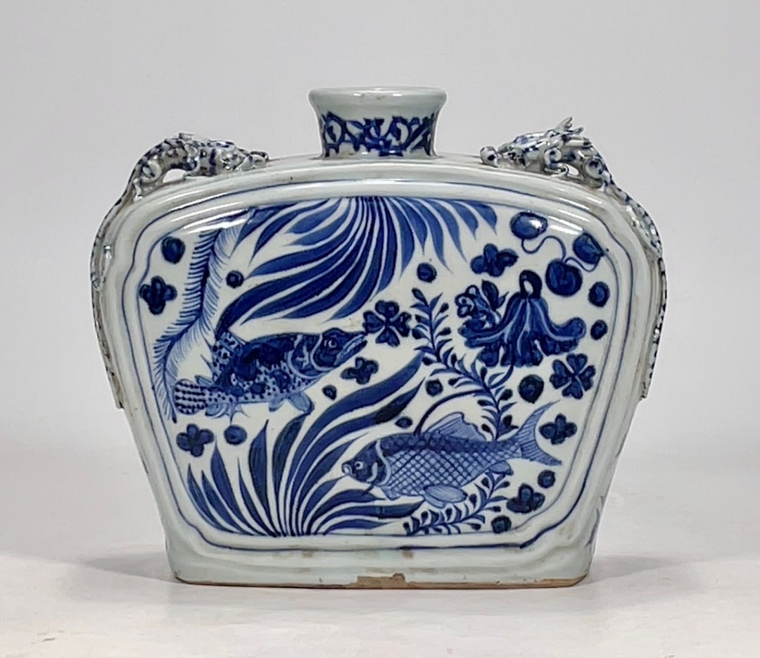 An Exquisite Blue and White Fish and Lotus Pattern Vase: An Exquisite Blue and White Fish and Lotus Pattern Vase Yuan Dynasty, China Size:7.5inx8.7in青花鱼藻纹扁壶 中国元代 Size:19cmx22cm
