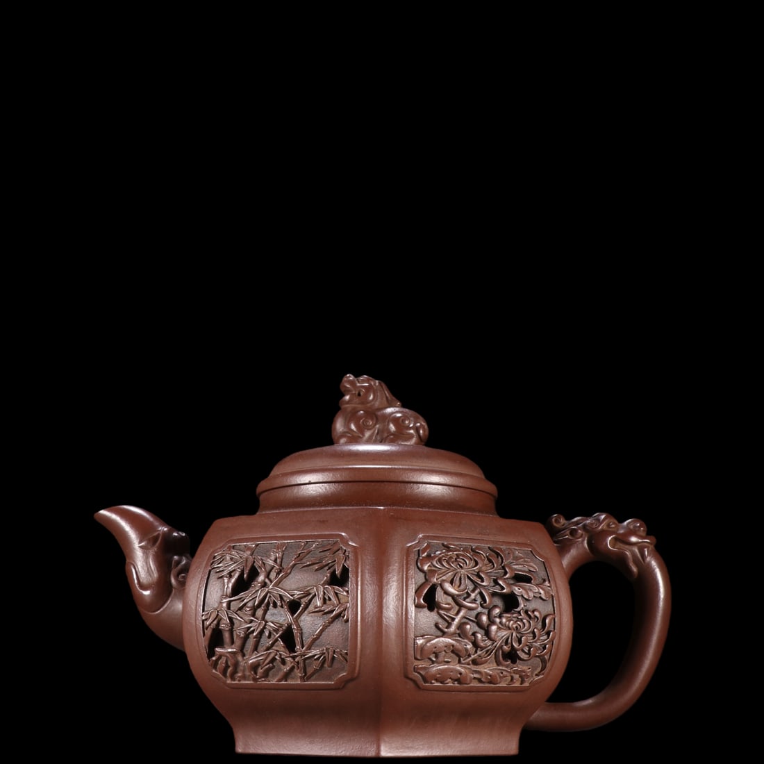 An Exquisite Purple Sands Flower Pattern Teapot: An Exquisite Purple Sands Flower Pattern Teapot Xu han tang Size:5.9inx8.3in紫砂梅兰竹菊六方壶 徐汉棠 Size:15cmx21.2cm
