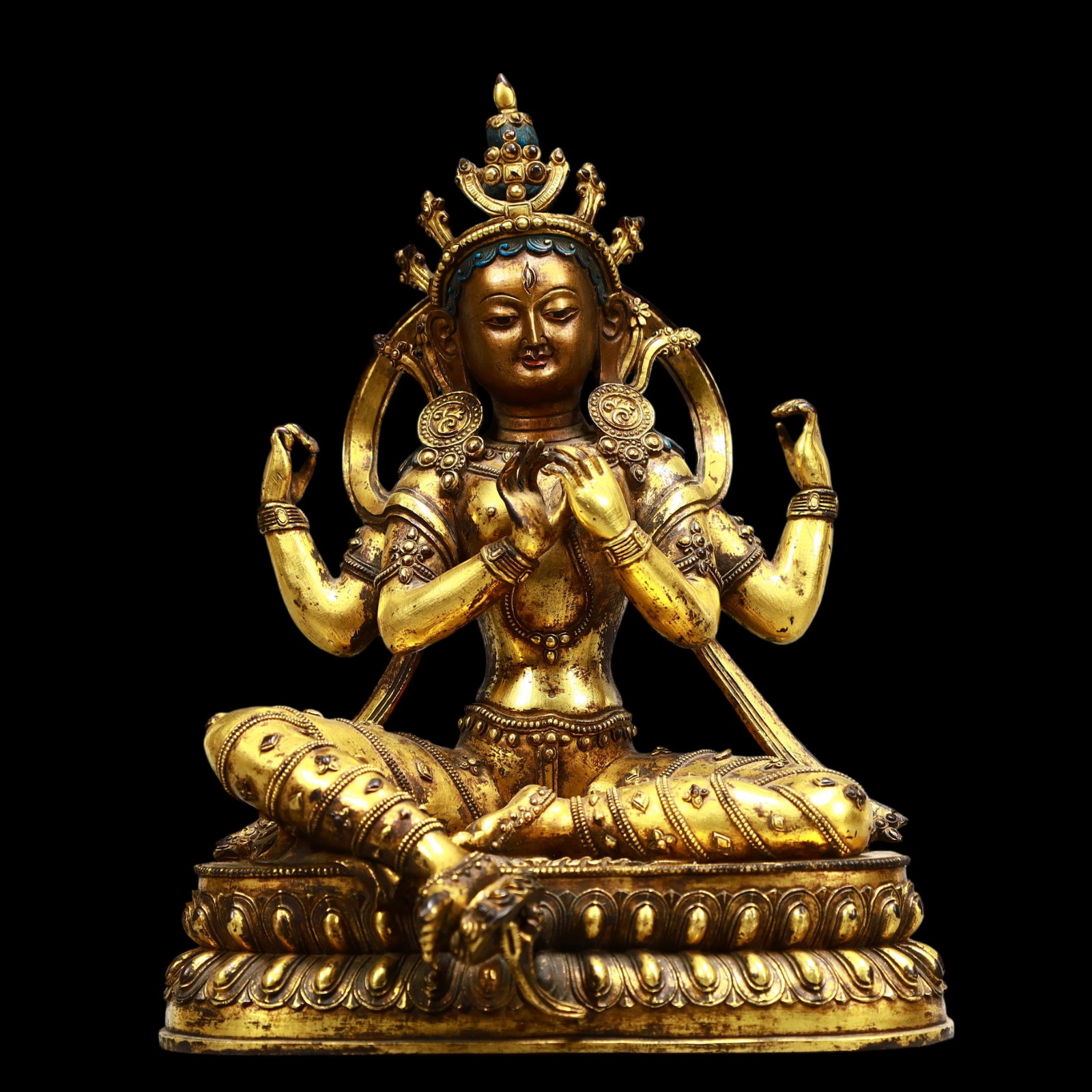 A Exquisite Gilt Bronze Four-arms Statue of Avalokitesvara: A Exquisite Gilt Bronze Four-arms Statue of Avalokitesvara Qing Dynasty, China Qianlong Six-character Mark Size:7.9inx6.3inx10in Weight:4300g铜鎏金四臂观音 &#
