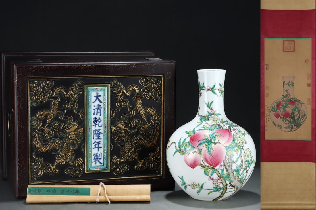An Exquisite Famille-Rose Bats and Peach Pattern Vase: An Exquisite Famille-Rose Bats and Peach Pattern Vase Qing Dynasty, China Qianlong Six-character Mark Without frame Size:25.2inx11.8in