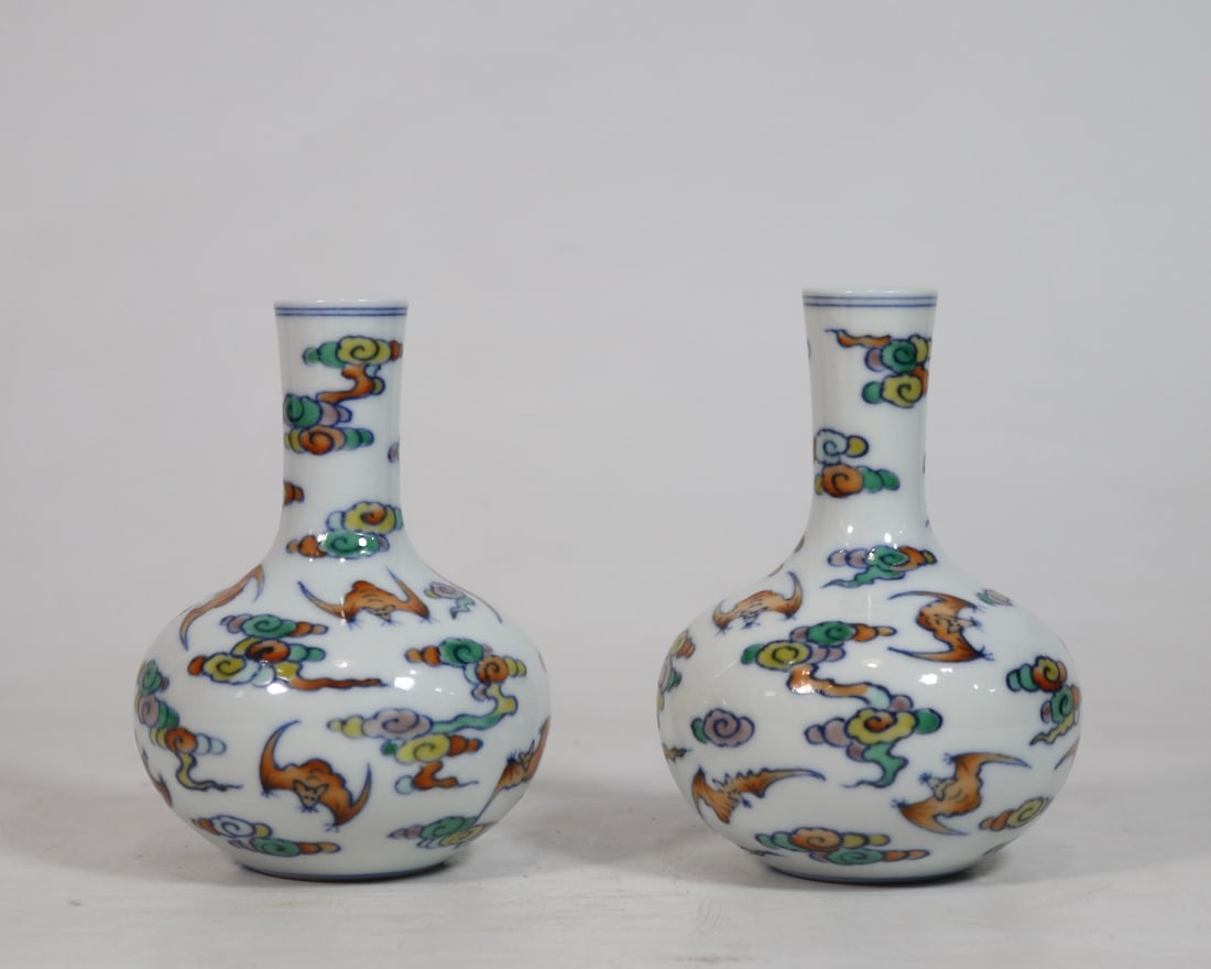 An Exquisite Doucai Bats Pattern Vase: An Exquisite Doucai Bats Pattern Vase Qing Dynasty, China Qianlong Six-character Mark Size:4.1inx3.1in斗彩洪福齐天小天球瓶