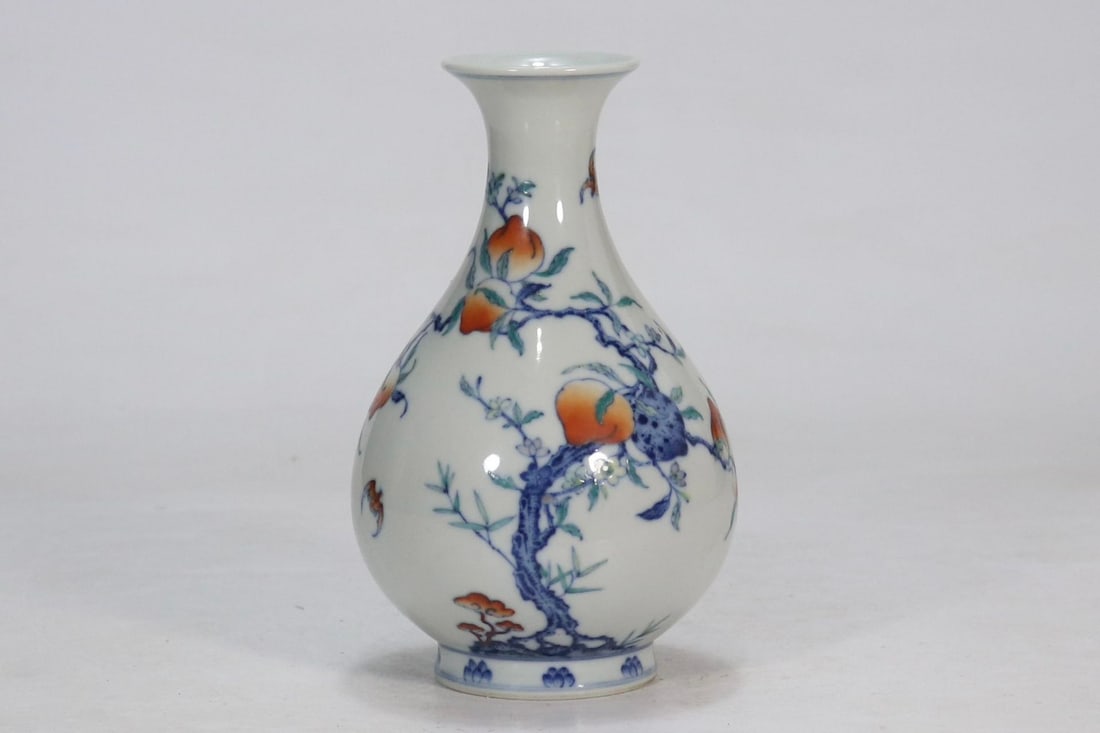 An Exquisite Doucai Bats and Peach Pattern Vase: An Exquisite Doucai Bats and Peach Pattern Vase Qing Dynasty, China Qianlong Six-character Mark Size:6.5inx2in斗彩九桃玉壶春瓶 中国清&