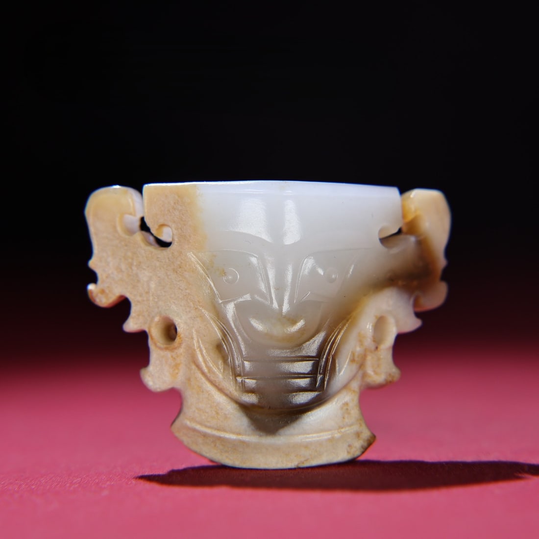 An Exquisite White Jade Human face Pattern Pendant: An Exquisite White Jade Human face Pattern Pendant Han Dynasty, China Size:1.7inx2.2inx0.8in Weight:63g白玉神人首挂饰 中国汉代 Size:4.