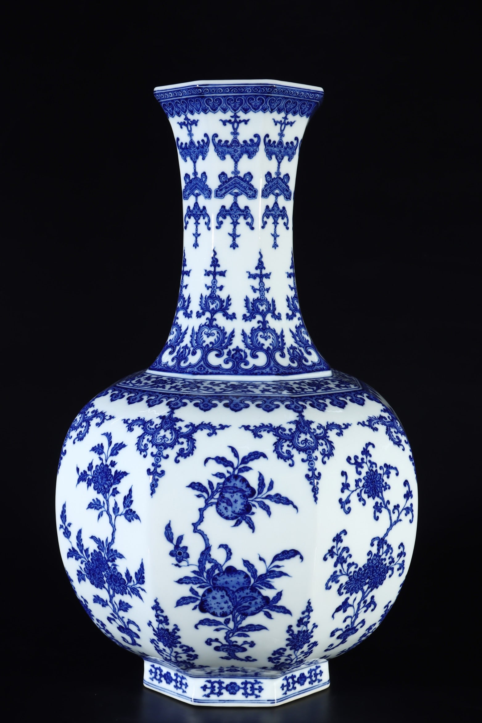 An Exquisite Blue and White Flower and Fruit Pattern Vase: An Exquisite Blue and White Flower and Fruit Pattern Vase Qing Dynasty, China Qianlong Six-character Mark Size:21.7inx13.8in青花三花三果纹八方