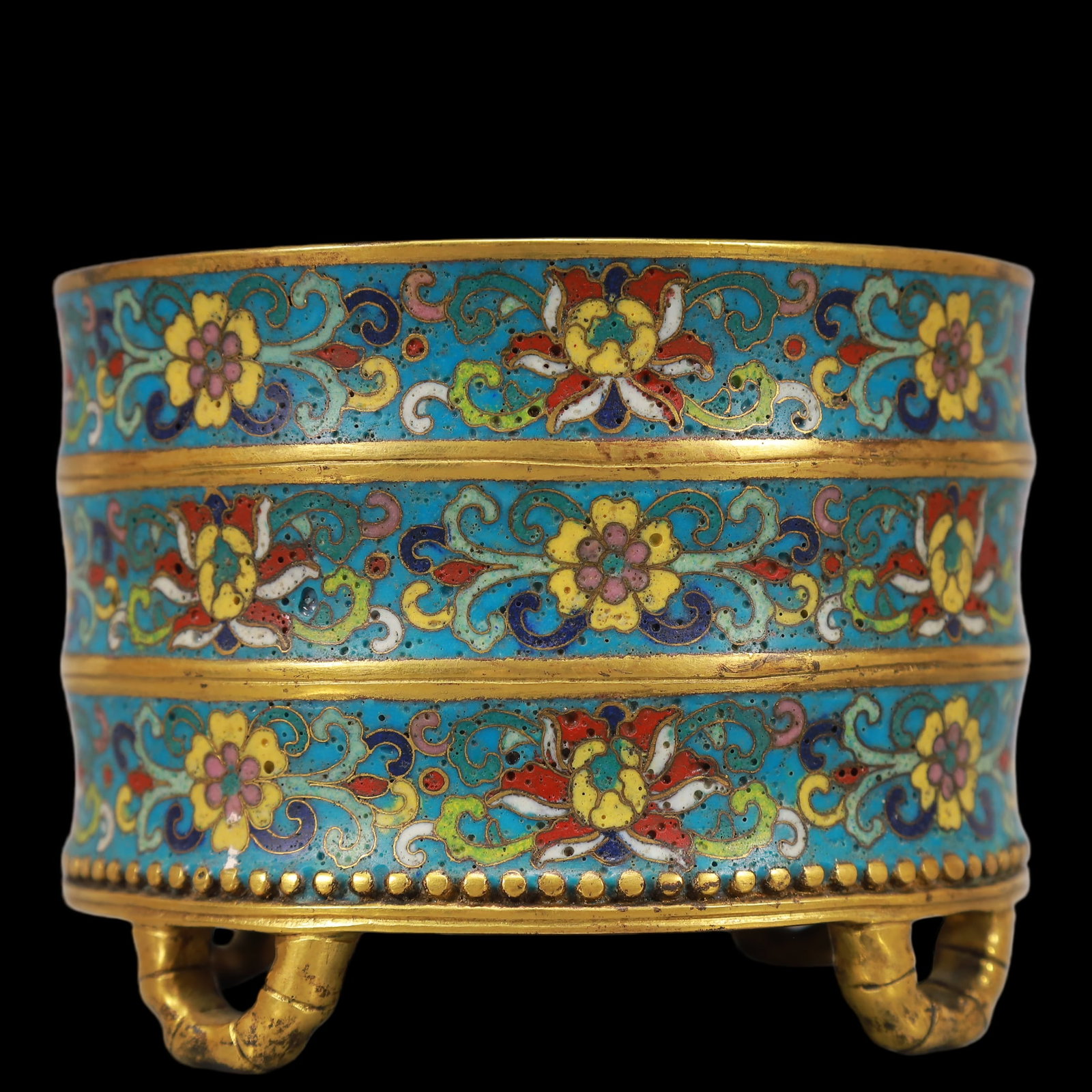 An Exquisite Cloisonne Gilt Bronze Lotus Pattern Tripod Censer: An Exquisite Cloisonne Gilt Bronze Lotus Pattern Tripod Censer Qing Dynasty, China Qianlong Four-character MarkSize:4.5inx4.5inx3.5in Weight:1500g景泰蓝铜鎏金ಶ