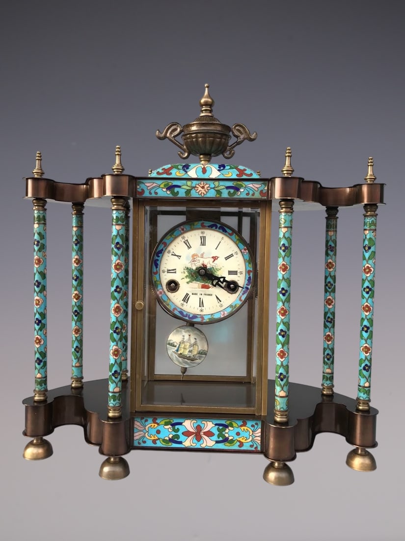 An Exquisite Bronze Lotus Pattern Figure Pattern Clock: An Exquisite Bronze Lotus Pattern Figure Pattern Clock Qing Dynasty, China Size:15.7inx7.1inx17.7in铜缠枝莲纹人物纹钟表 中国