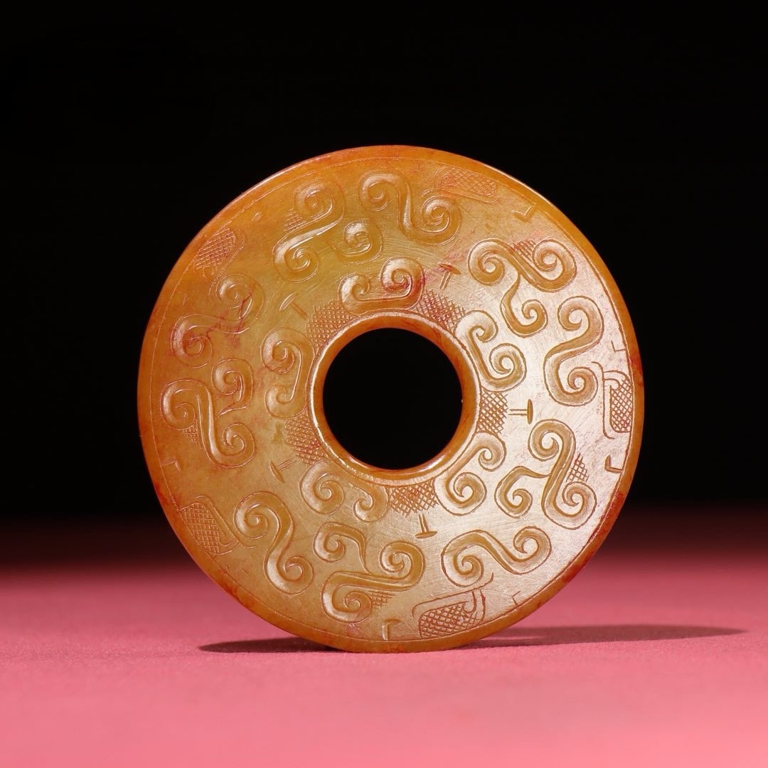 An Exquisite White Jade Ornament: An Exquisite White Jade Ornament the Spring and Autumn in Period in China Size:3.6inx0.2in Weight:104g白玉璧摆件 春秋时期 Size:9.1cmx0.5cm Weight: