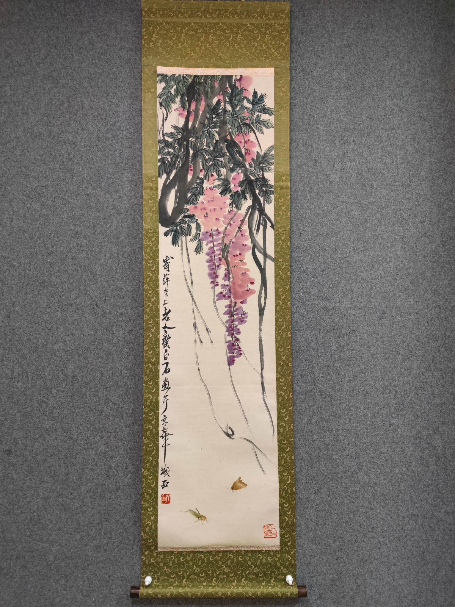 A Chinese Vertical Scroll Ink Painting of Flower on Paper: A Chinese Vertical Scroll Ink Painting of Flower on Paper Qi baishi Without frame Size:52.8inx13.2in齐白石写意紫藤 纸本立轴Without fra