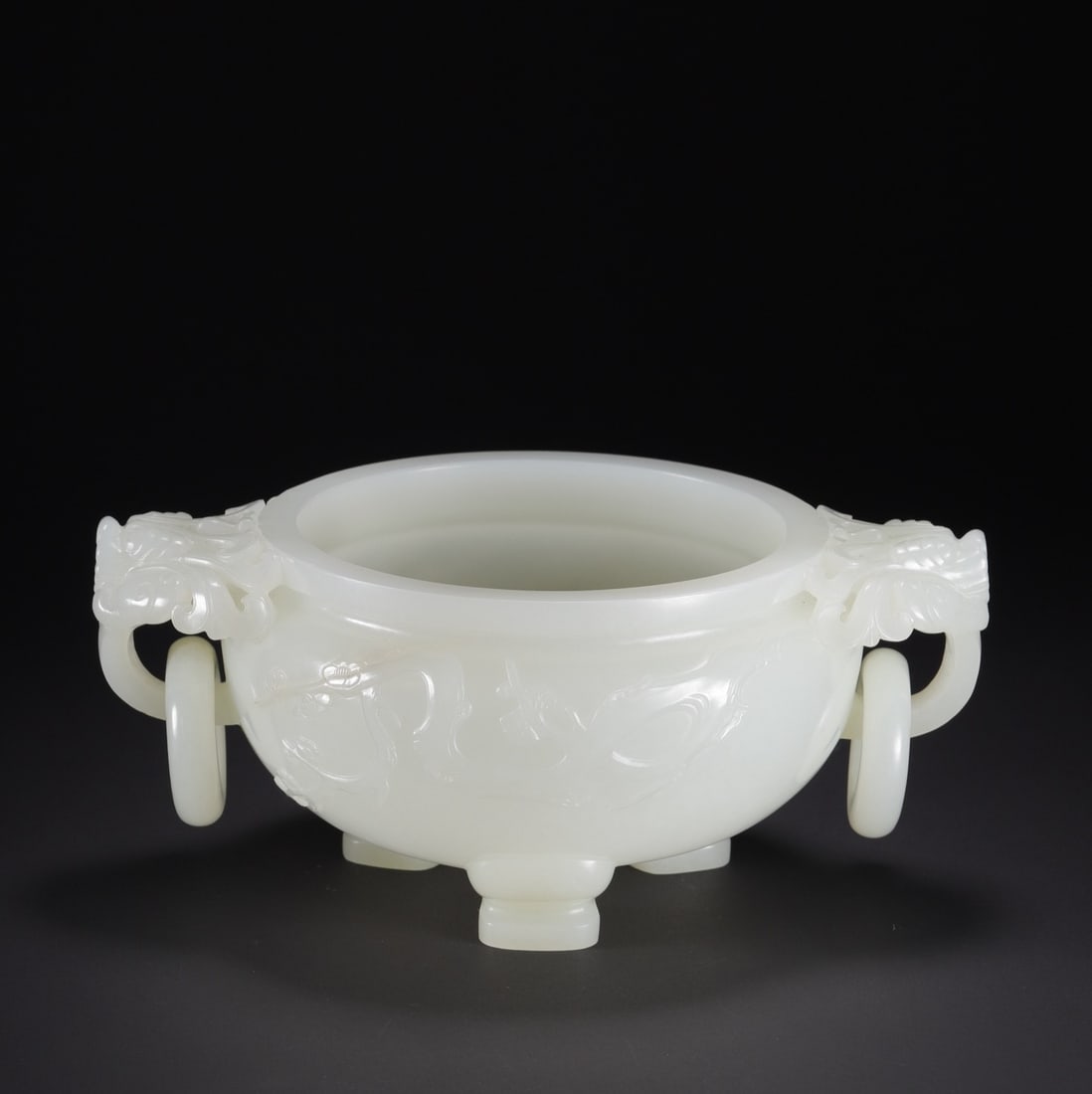 An Exquisite White Jade Double-Ears Tripod Censer: An Exquisite White Jade Double-Ears Tripod Censer Qing Dynasty, China Size:6.5inx4.6inx2.7in Weight:556.2g白玉三足活环耳炉