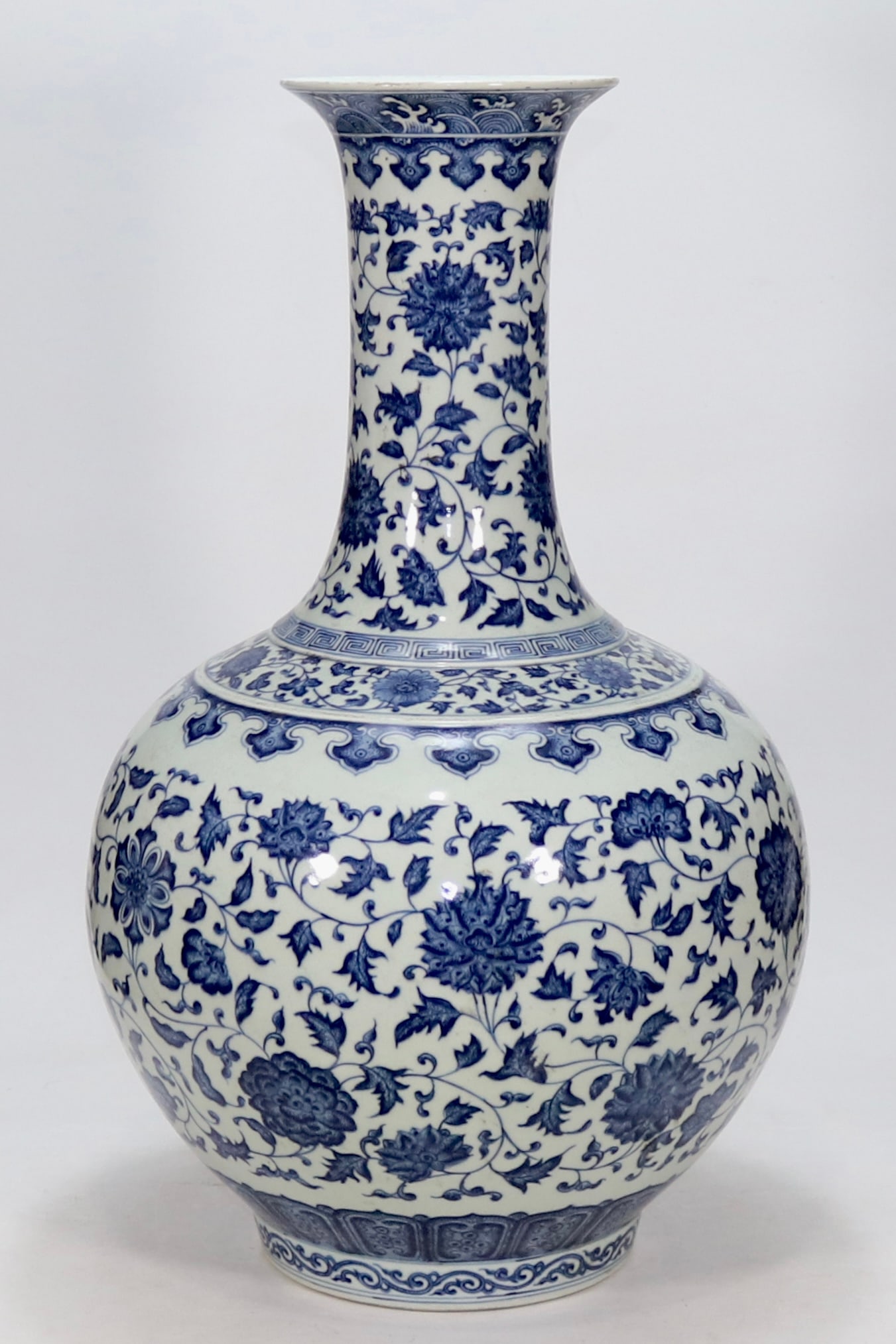 An Exquisite Blue and White Lotus Pattern Vase: An Exquisite Blue and White Lotus Pattern Vase Qing Dynasty, China Qianlong Six-character Mark Size:24.4inx6.7in青花缠枝花卉纹赏瓶 中国