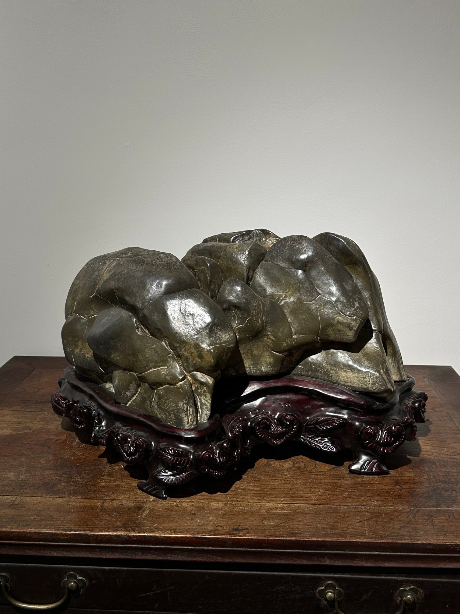 An Exquisite Lingbi Stone Rockery Ornament: An Exquisite Lingbi Stone Rockery Ornament Qing Dynasty, China Size:22inx11.8inx14.2in灵璧石文房山摆件 中国清代 Size:56cmx30cmx3
