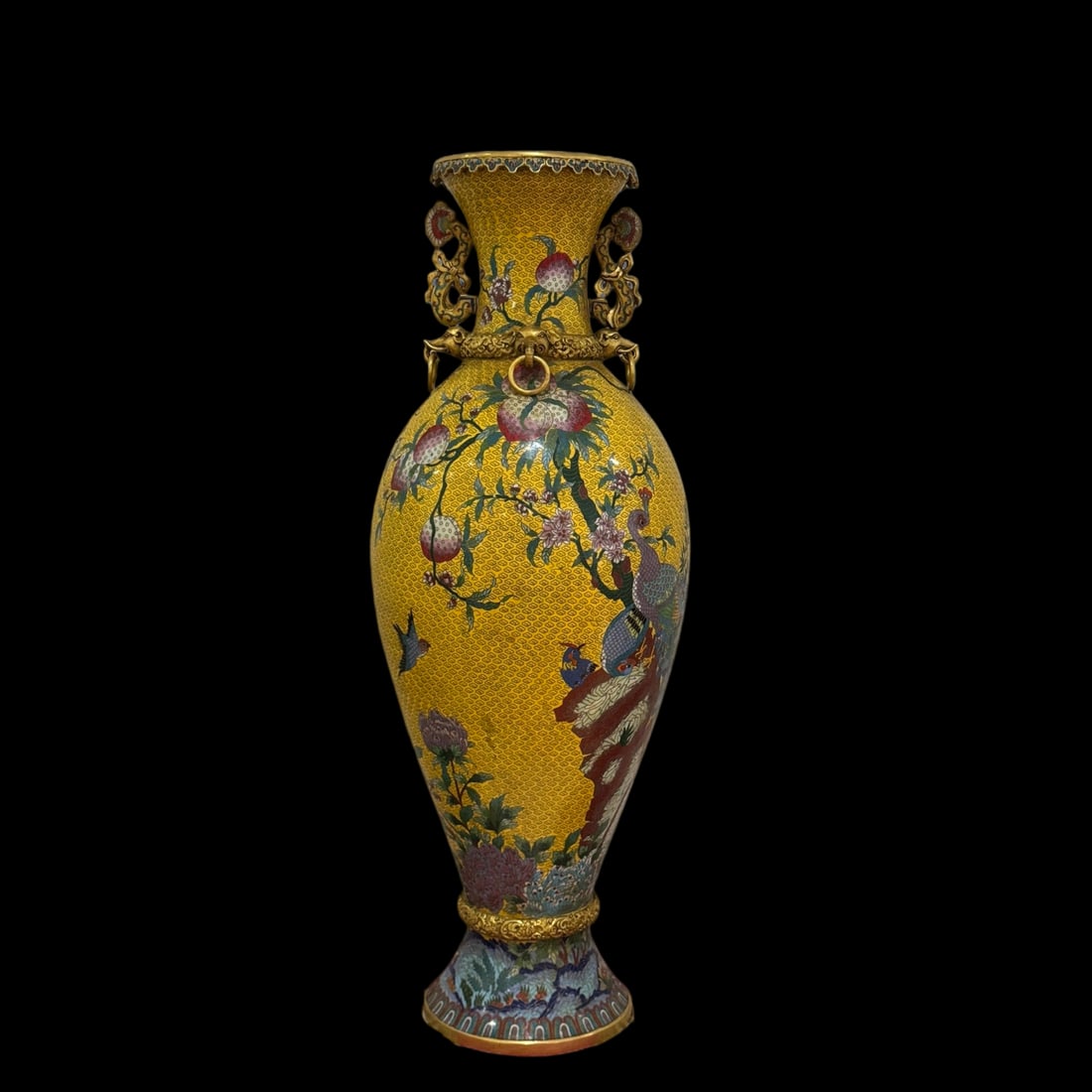 An Exquisite Cloisonne Flower and Bird Pattern Vase: An Exquisite Cloisonne Flower and Bird Pattern Vase Qing Dynasty, China Qianlong Four-character Mark Size:30.7inx11.8in Weight:21.6kg景泰蓝橄榄瓶 中国&#
