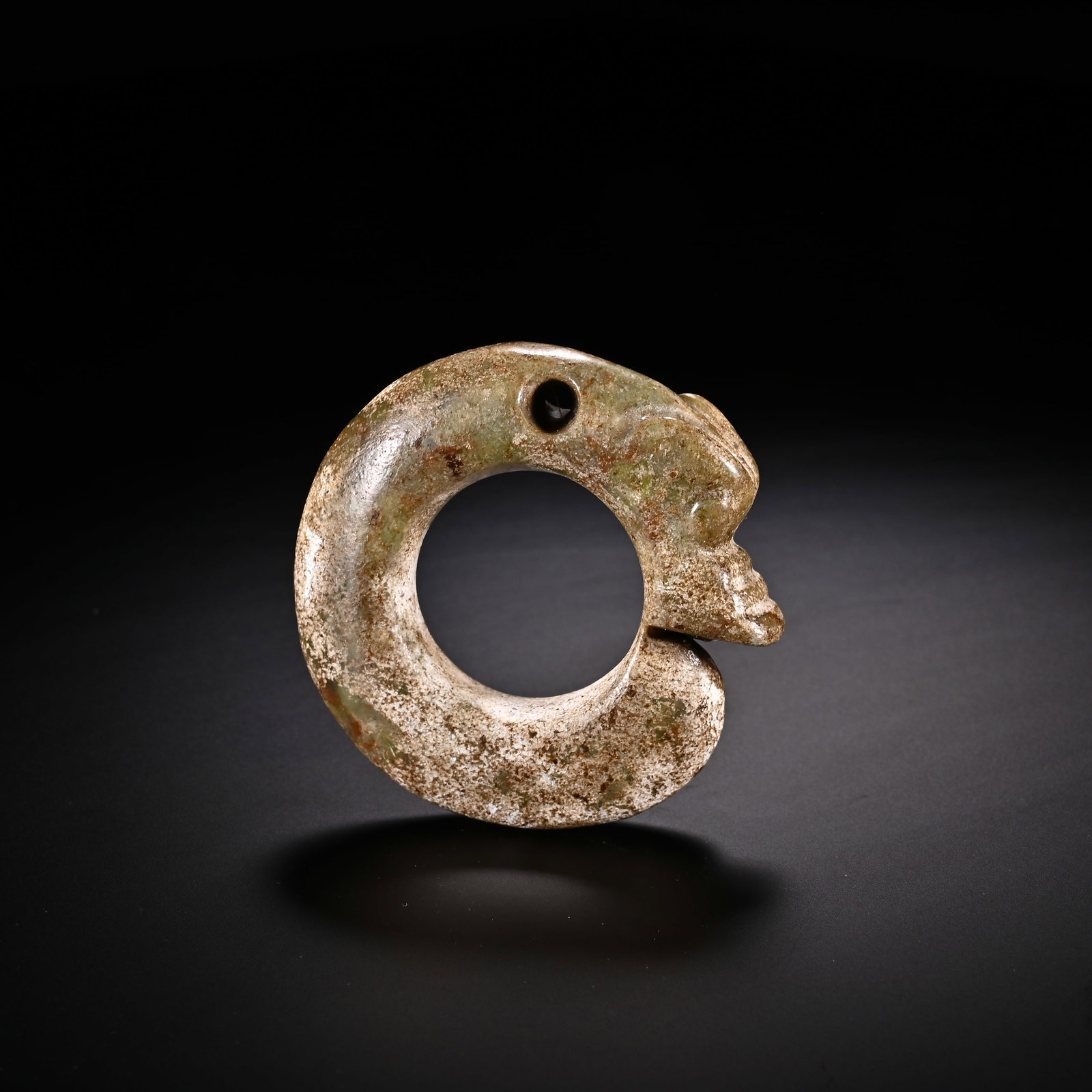 An Exquisite White Jade 'Boar& Dragon' Pendant: An Exquisite White Jade 'Boar& Dragon' Pendant Han Dynasty, China Diameter Size:2.1in Weight:44g白玉猪龙挂件 中国汉代 Diameter Size:5.4cm We