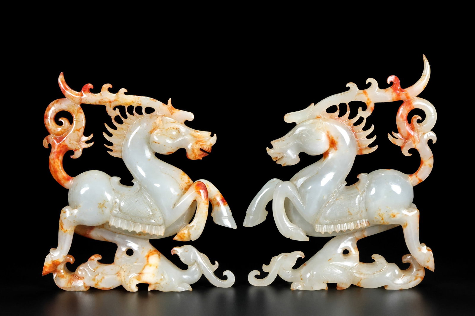 A Pair of Exquisite White Jade Horse Ornament: A Pair of Exquisite White Jade Horse Ornament Qing Dynasty, China Size:7.1inx6.7inx1.8in Total Weight:1266g白玉马踏飞燕一对