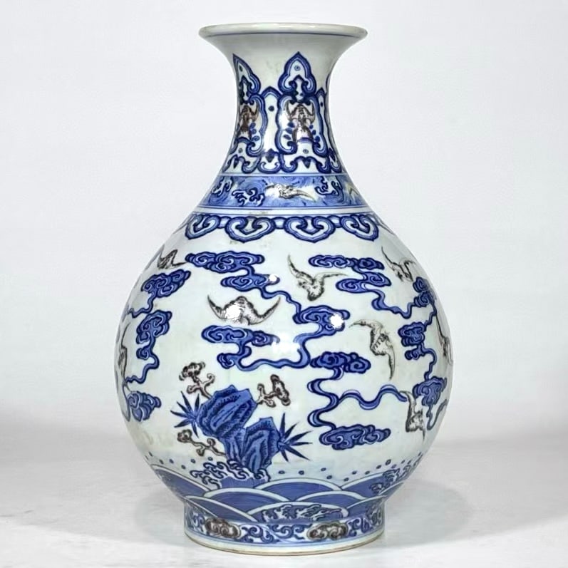 An Exquisite Blue and White Underglaze-Red Bats Pattern Seawater Pattern Vase: An Exquisite Blue and White Underglaze-Red Bats Pattern Seawater Pattern Vase Qing Dynasty, China Qianlong Six-character Mark