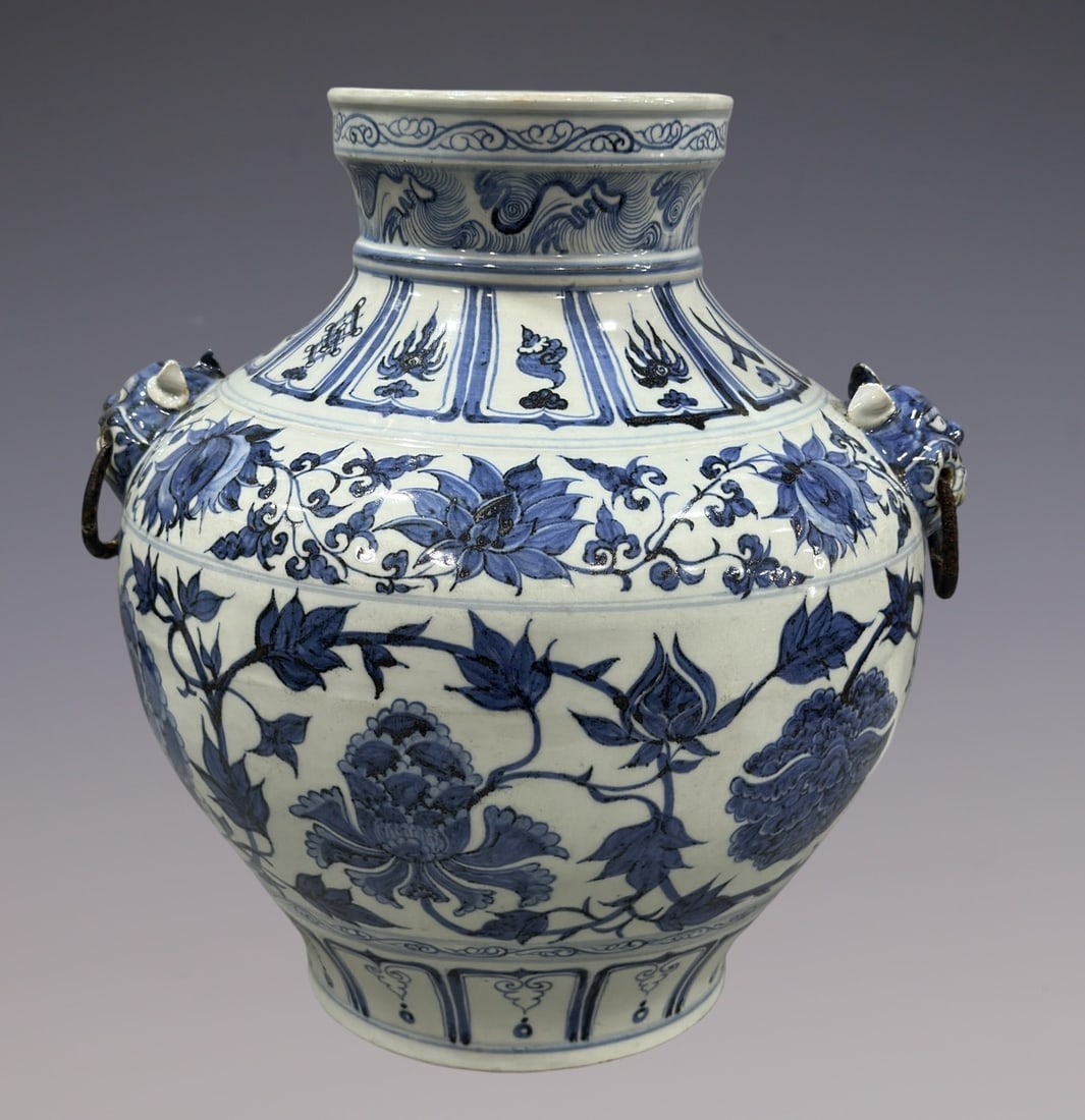An Exquisite Blue and White Lotus Pattern Double-Ears Jar: An Exquisite Blue and White Lotus Pattern Double-Ears Jar Yuan Dynasty, China Size:15.2in青花缠枝莲大罐 中国元代 Size:38.5cm