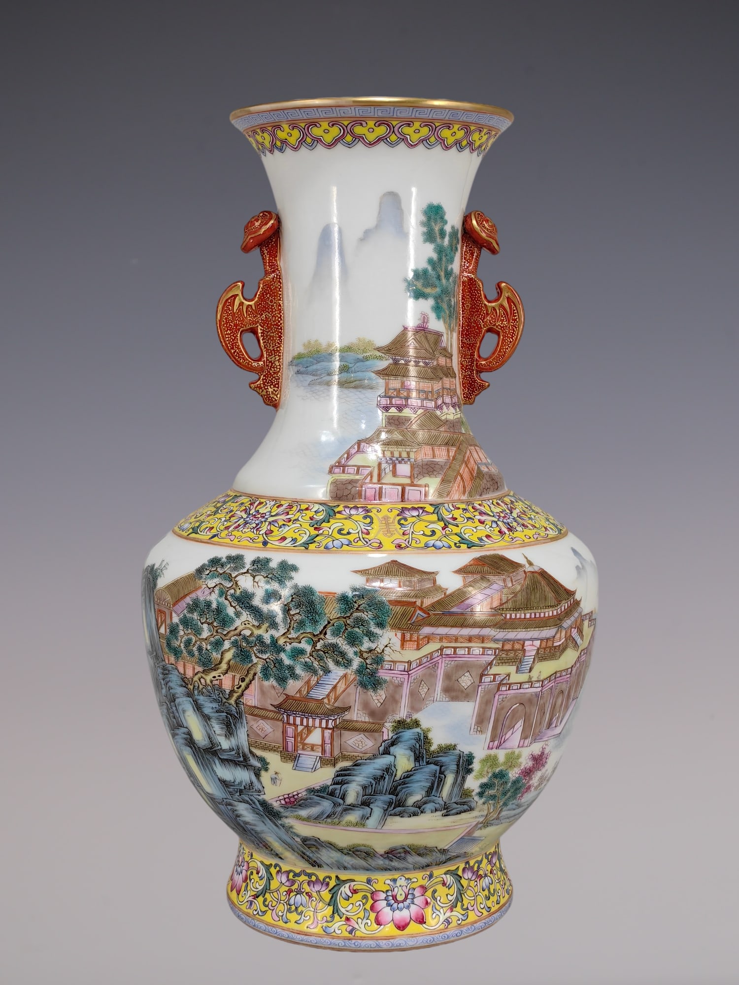 An Exquisite Famille-Rose Lotus Pattern Landscape Pattern Double-Ears Vase: An Exquisite Famille-Rose Lotus Pattern Landscape Pattern Double-Ears Vase Qing Dynasty, China Qianlong Six-character Mark Size:14.5inx9.4in粉彩楼台亭阁山